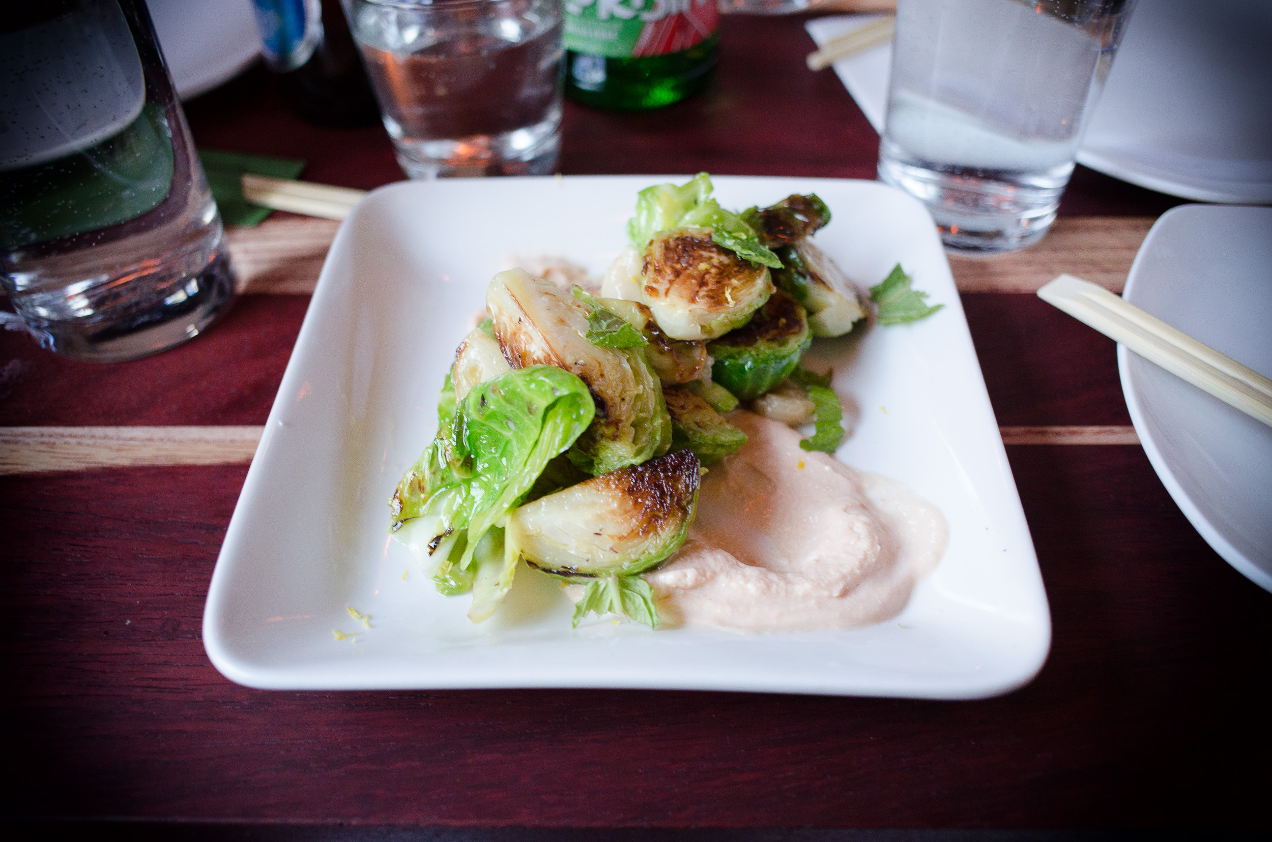 Roasted brussel sprout salad, shrimp-tofu schmear, garlic, mint