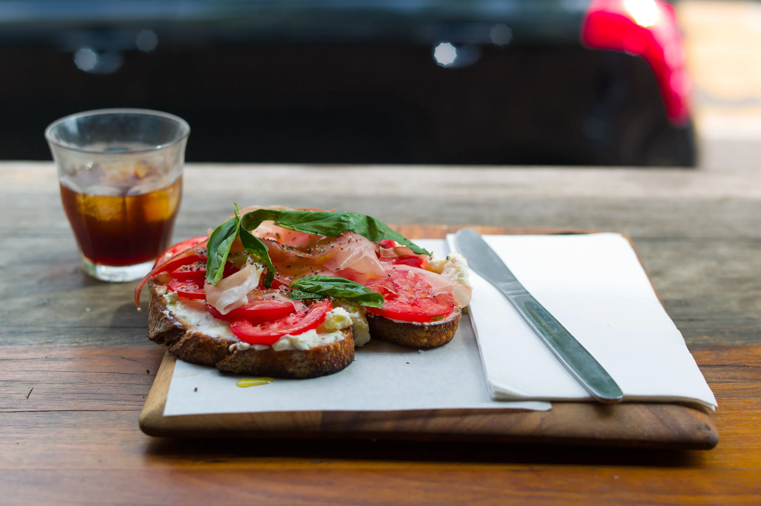 Bruschetta of tomato and ricotta, fresh basil, garlic, thyme-inf