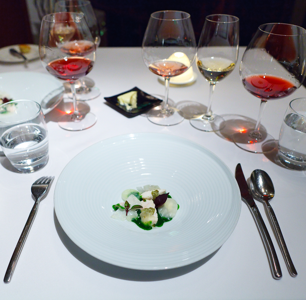 13th Course: Poached halibut served with with young celeriac, romanesco