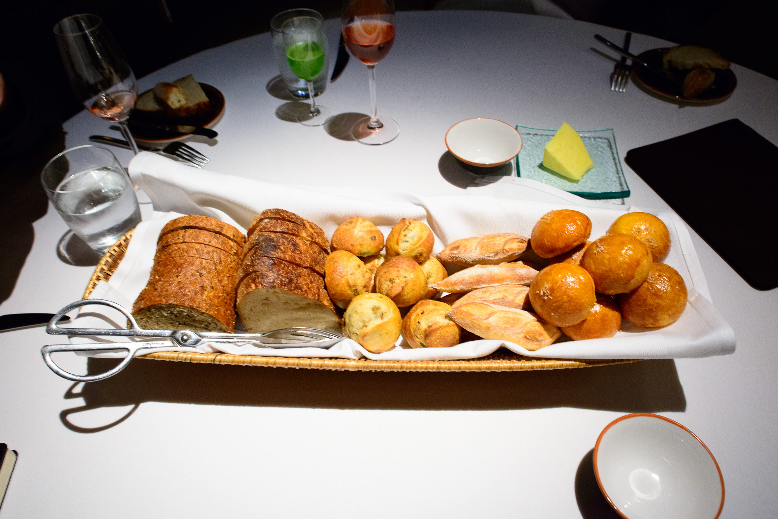 Bread selection: mixed seeds, sourdough, olive, baguette, milk