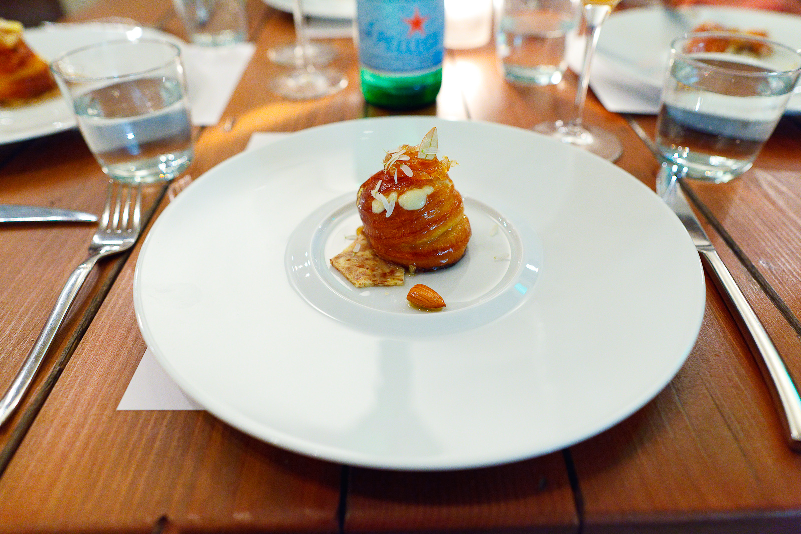 6th Course: Nuvola di percora - Warm nuvola di pecora piped into a freshly baked brioche with honeycomb.
