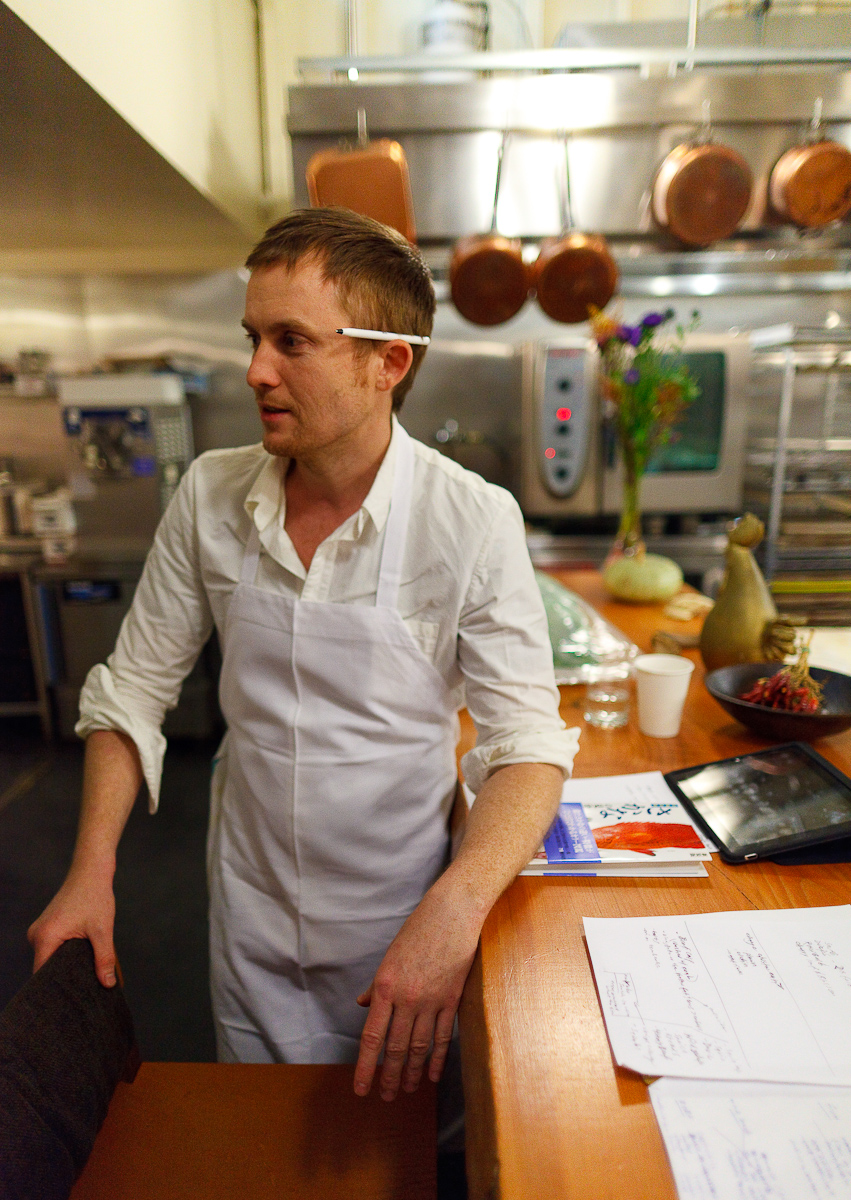 Portrait of Chef Joshua Skenes with Japanese Fish Identification Book