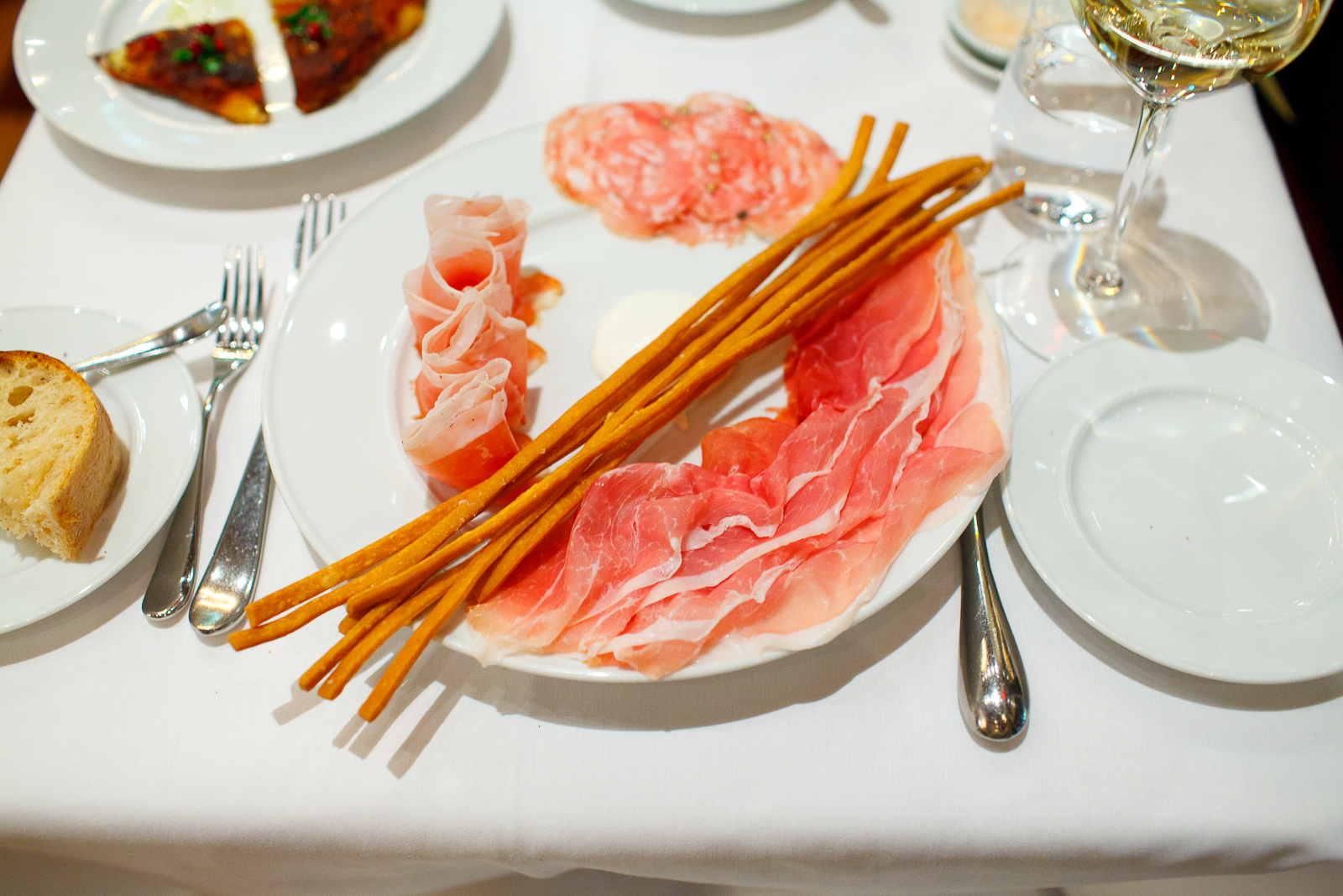 Snacks: Prosciutto di San Daniele Riserva, Friuli, Italy; Speck, Alto Adige, Italy; Salame Toscano, Fra'mani, Berkeley, California, with "Rafano" and "Grissini"