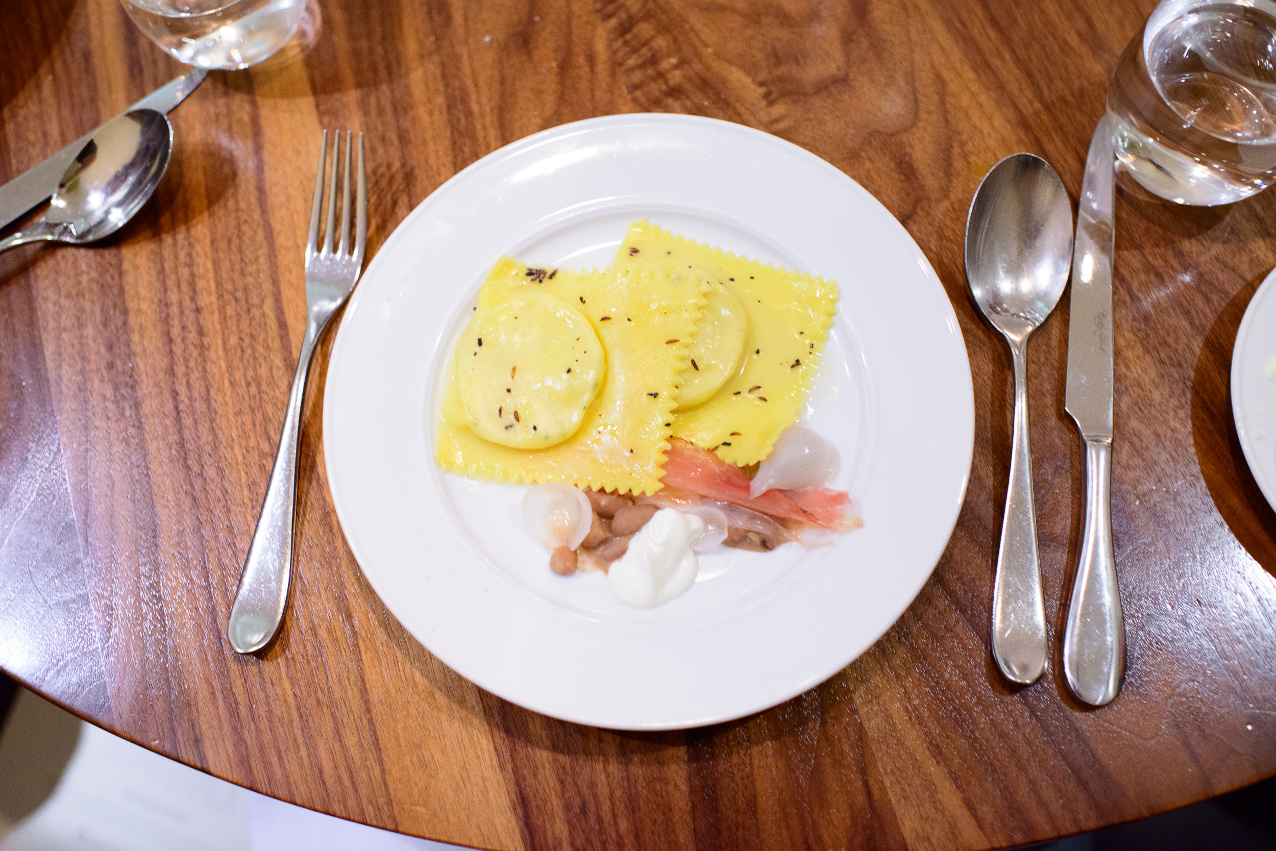 "Ravioli" - potato, sauerkraut, speck, and borlotti bean