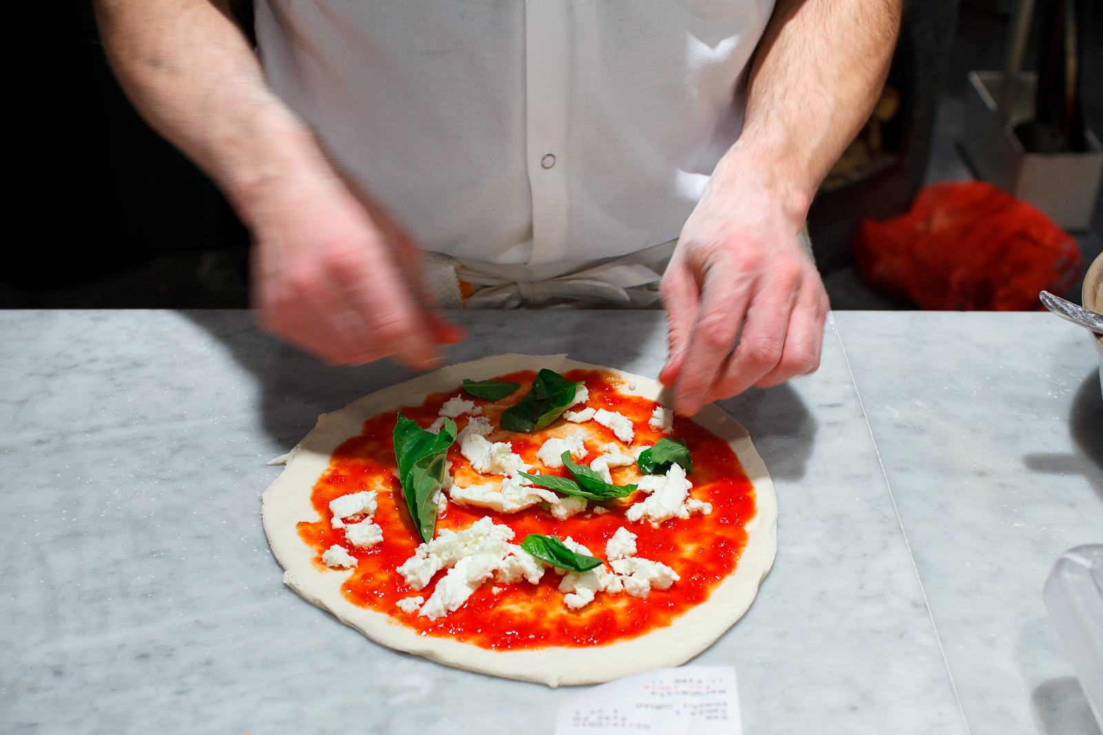 Making a pizza margherita