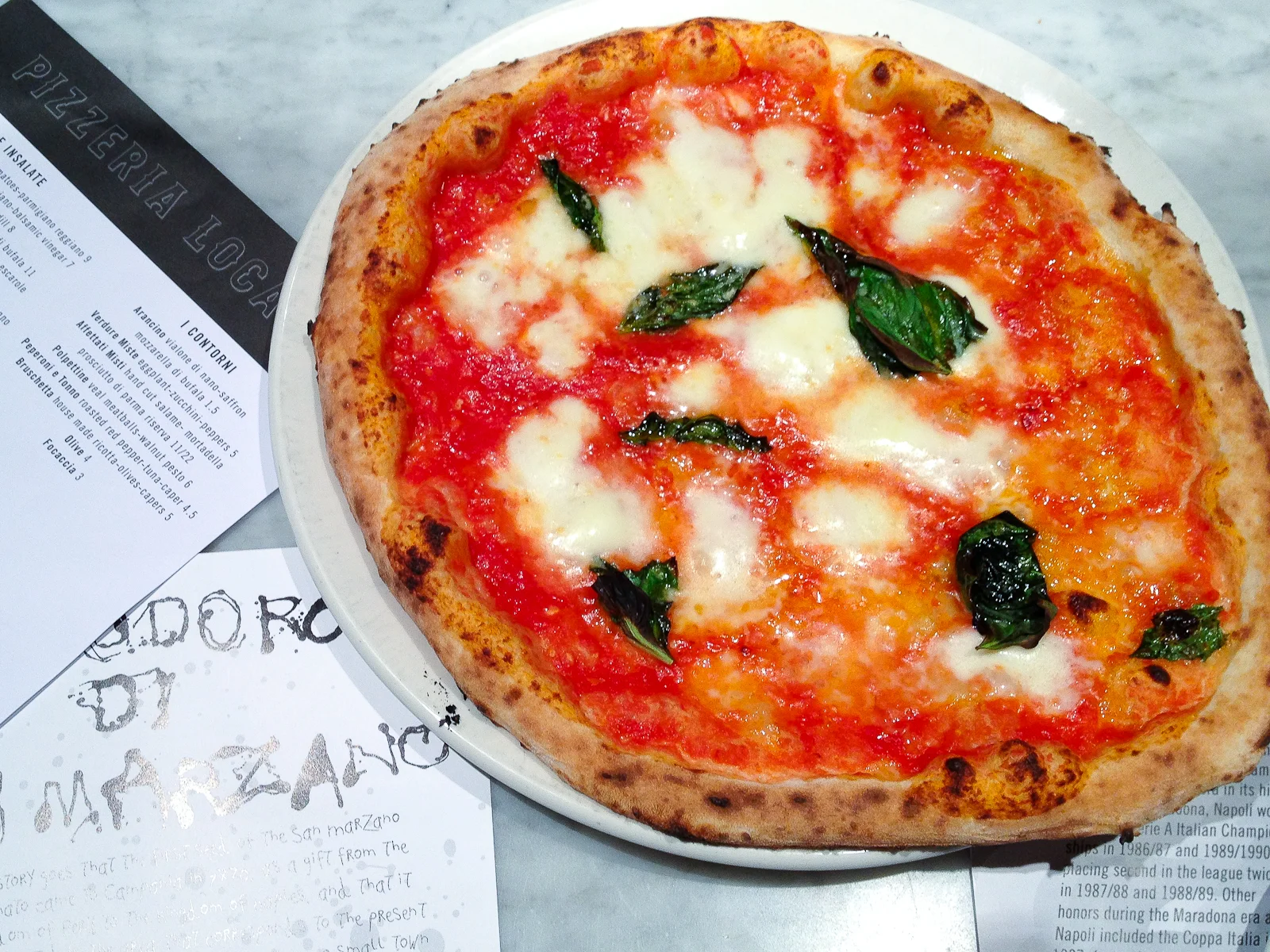 Pizza margherita - mozzarella di bufala, san marzano tomatoes, basil ($13)