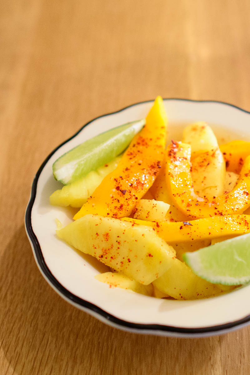 Mango and pineapple with chili, lime, and salt