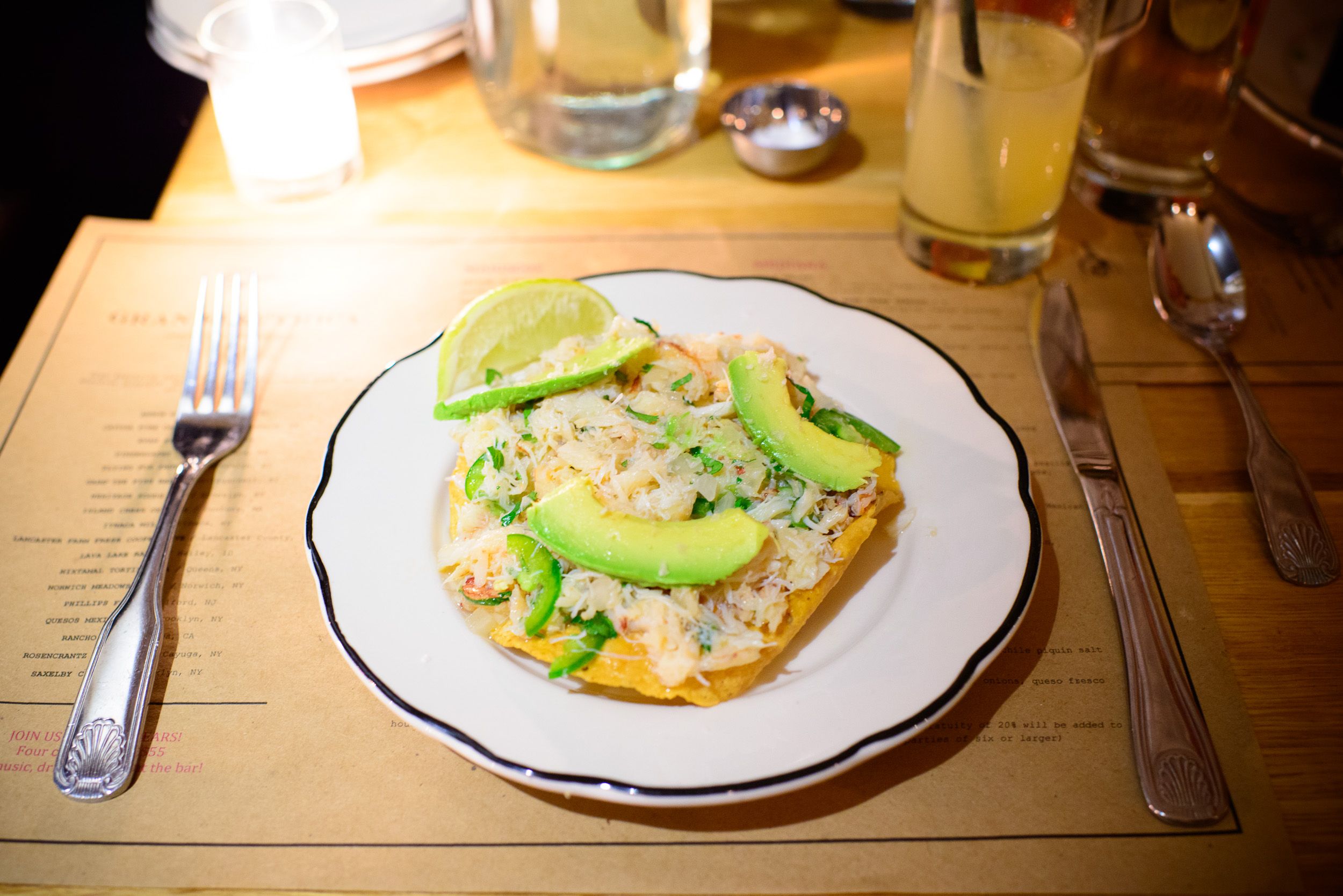 Tostada de Jaiba - peekytoe crab, lime, avocado, jalapeño