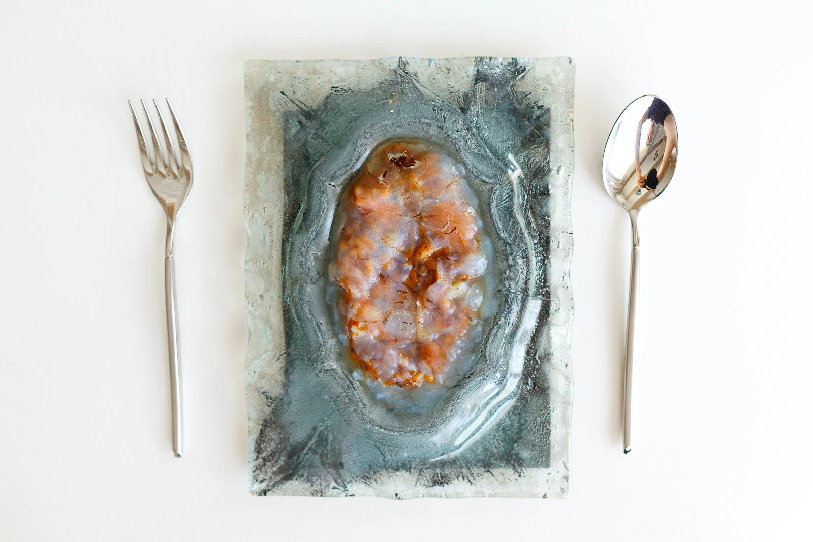 13th Course: Uni rice and sage layered with raw thinly-sliced local prawn