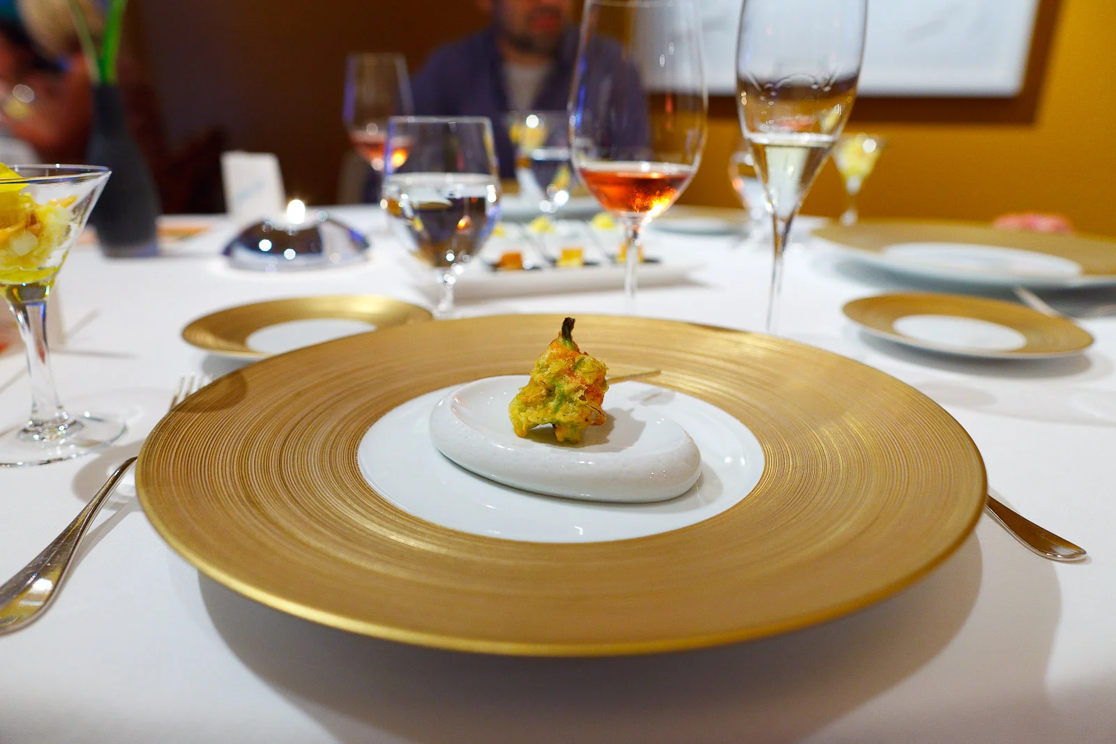 Amuse bouche: courgette flower with yellow tempura