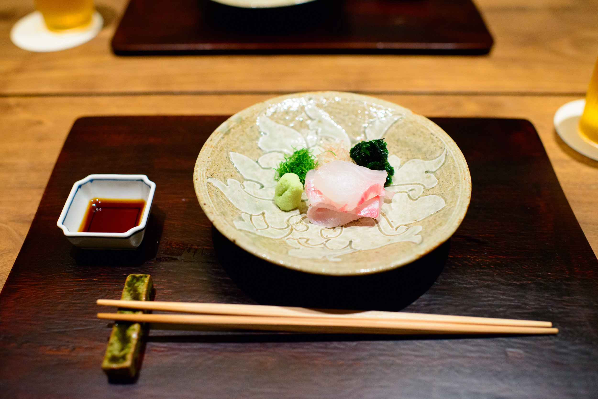 4th Course: Tai (sea bream) sashimi garnished with seaweed and J