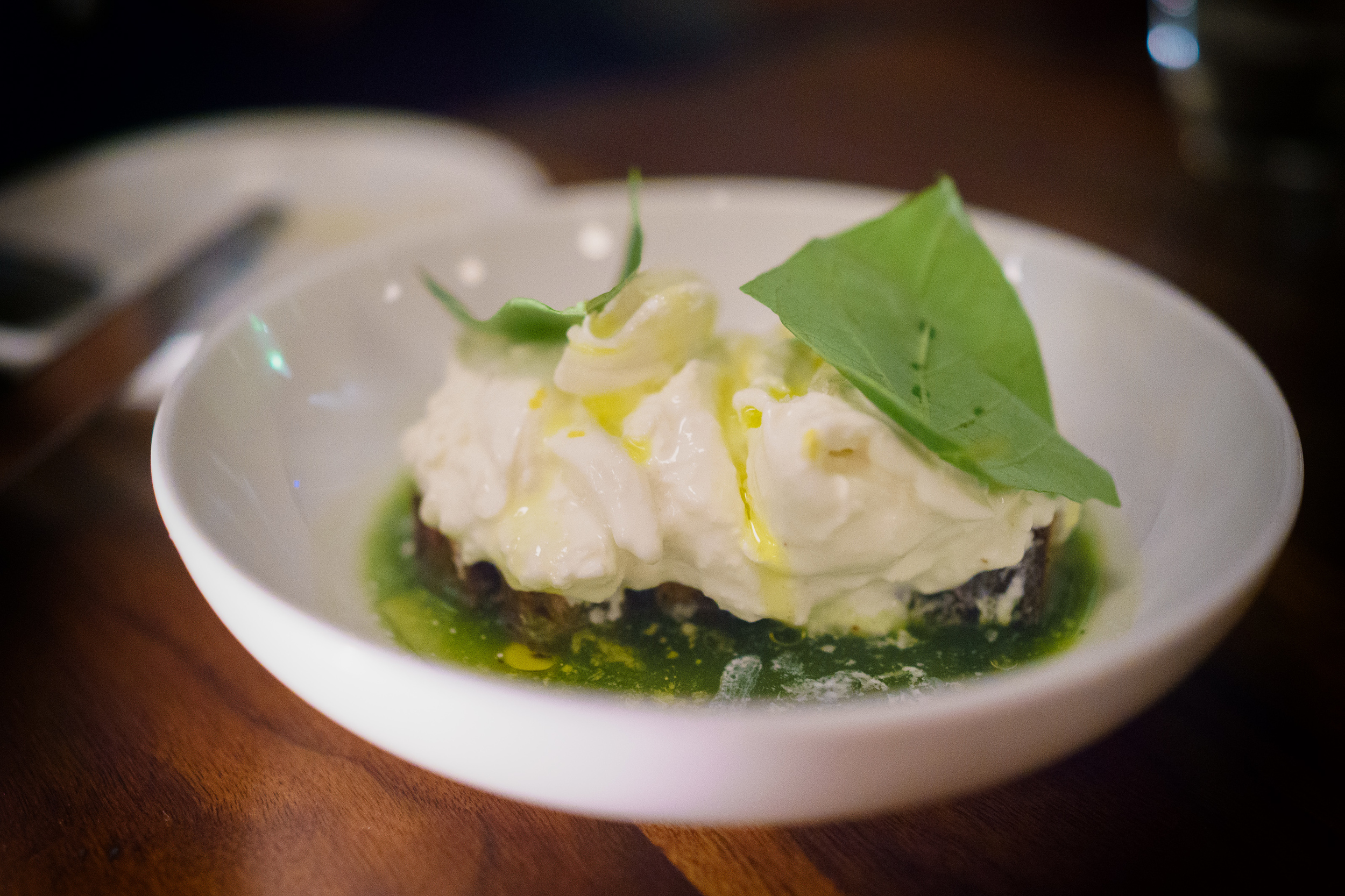 Burrata with salsa verde and charred bread ($17)