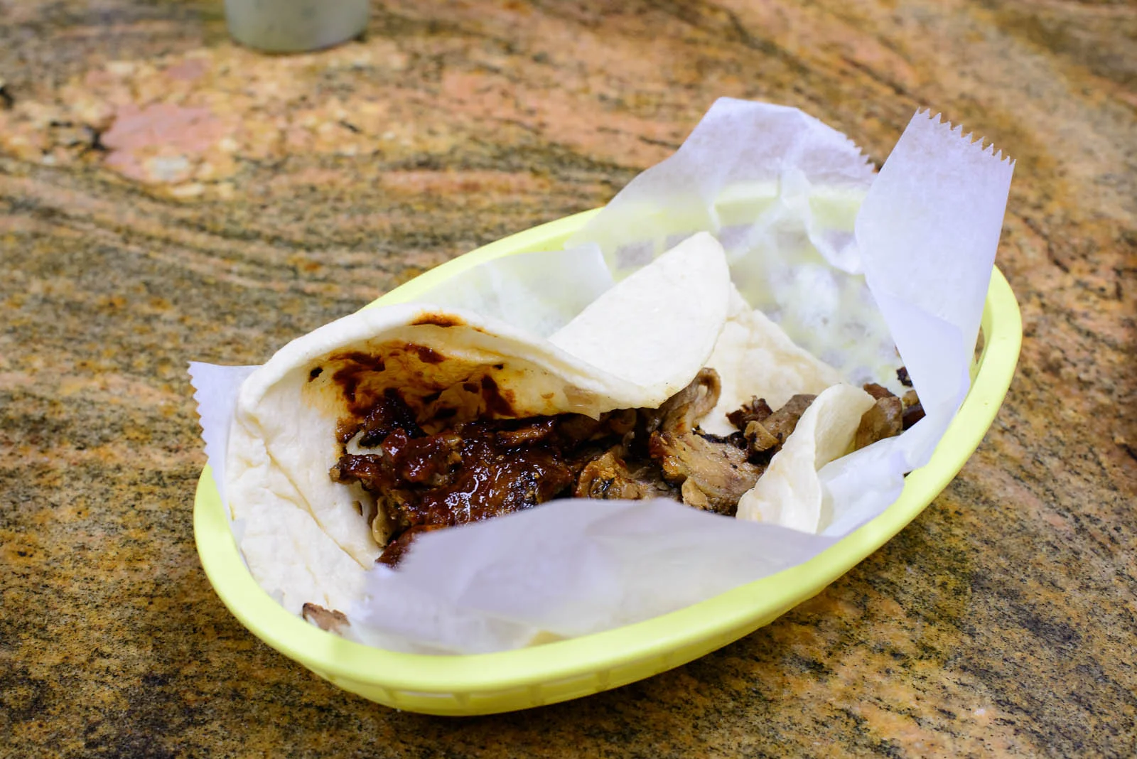 Taco arabe - spit-roasted pork and onions wrapped in a thick tor