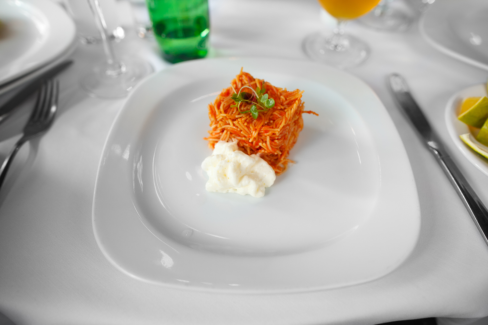 Fideo seco, con espuma de queso añejo y cremoso de aguacate (dried noodles with aged cheese foam and an avocado cream) (65 MXP)