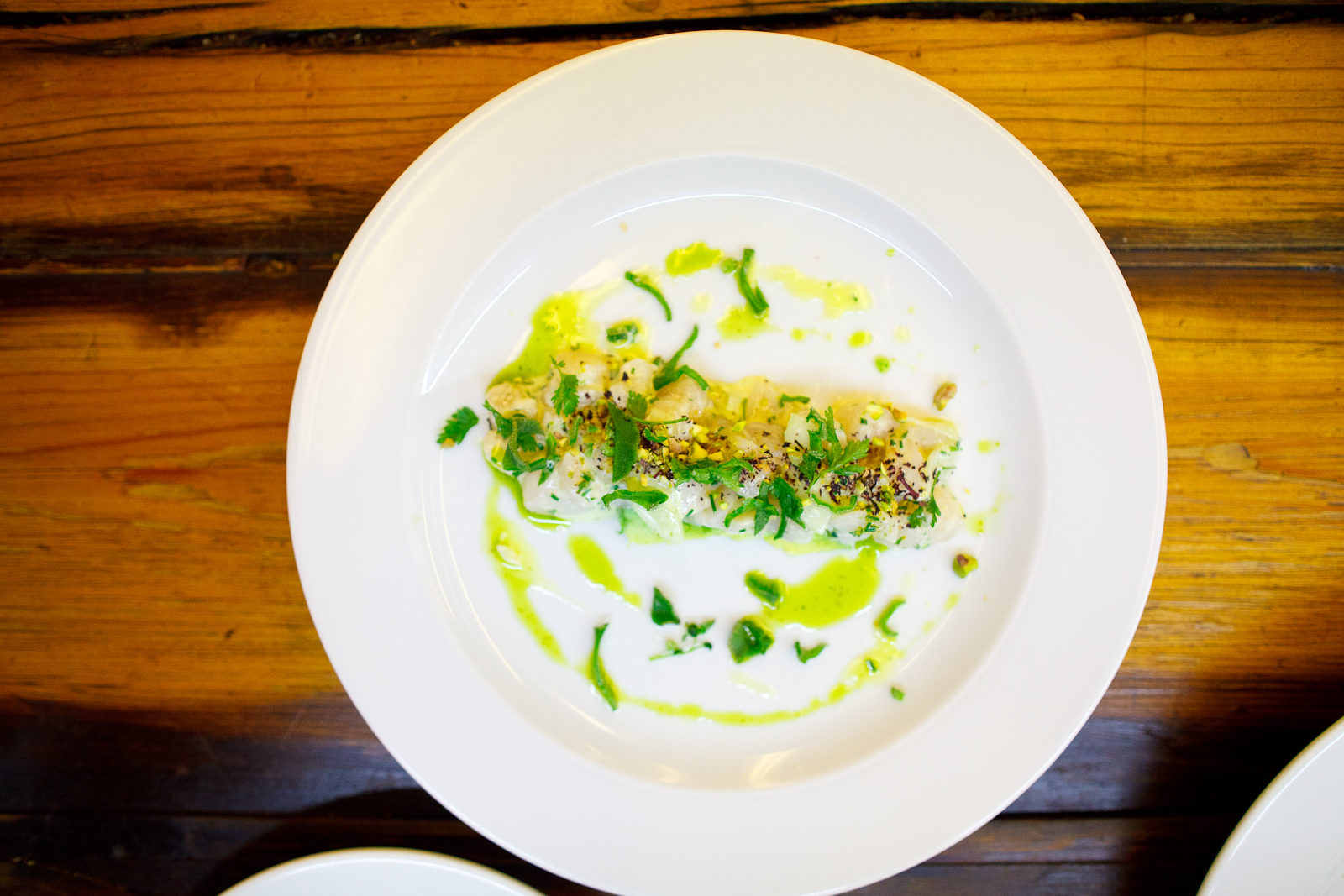 Diver scallops with cucumber, lime, pistachio, and ice plant