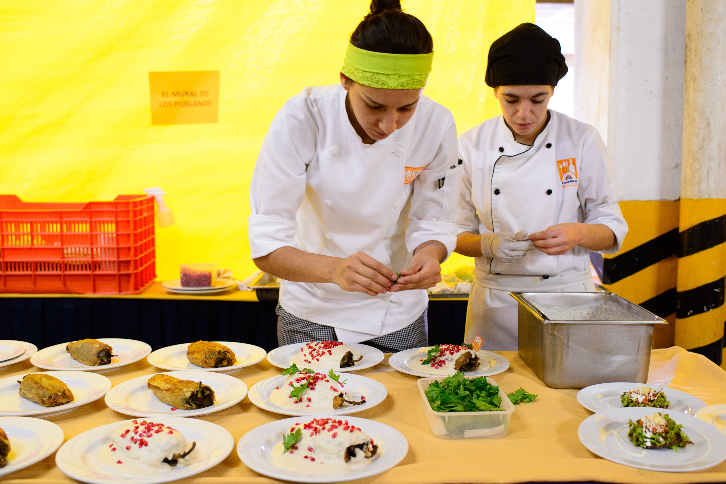 Chef Liz Galicia and assistant of El Mural de los Poblanos plati