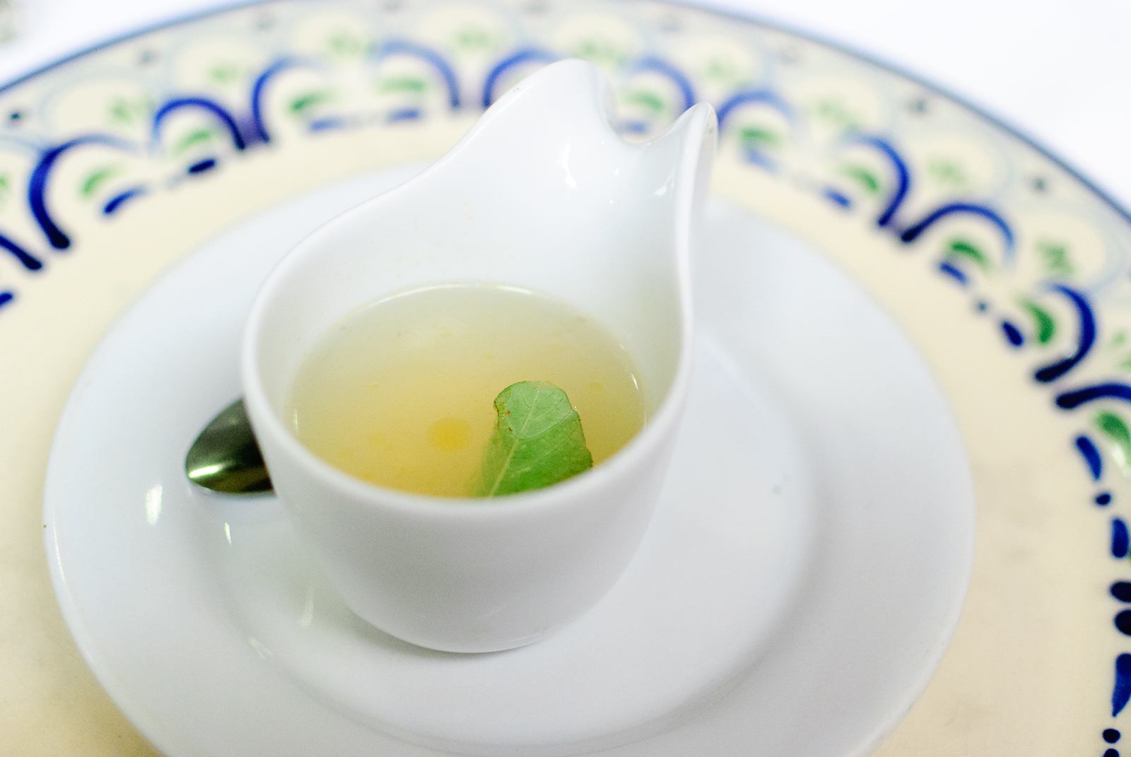 Amuse bouche: caldo de te de limón con quintonil (lemon broth with quintonil)