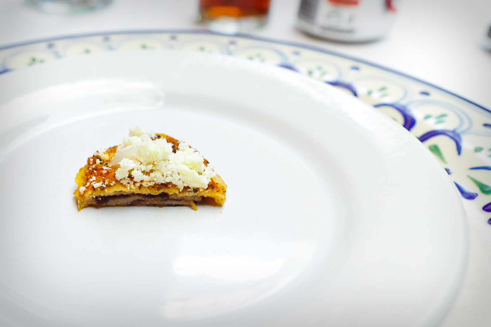 Inside of a tlacoyo -- a thin layer of corn tortilla filled with black beans from Chignahuapan