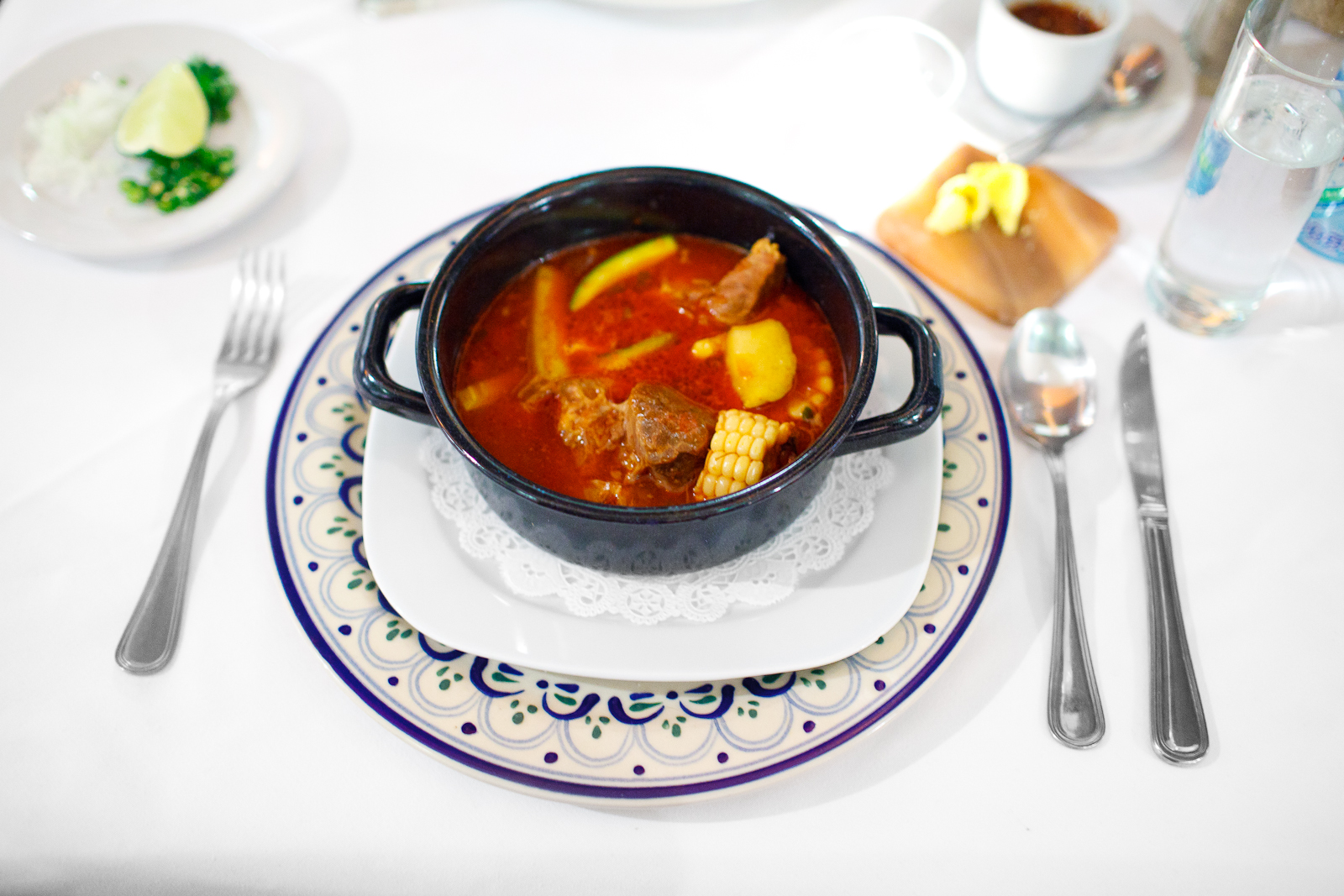 Mole de olla - Trozos de chambarete cocinados en caldillo de jitomate con elotes, calabazas, xoconostle, ejotes, y el grado exacto de picor (Pueblan beef tomato stew with corn, squash, opuntia,beans) 