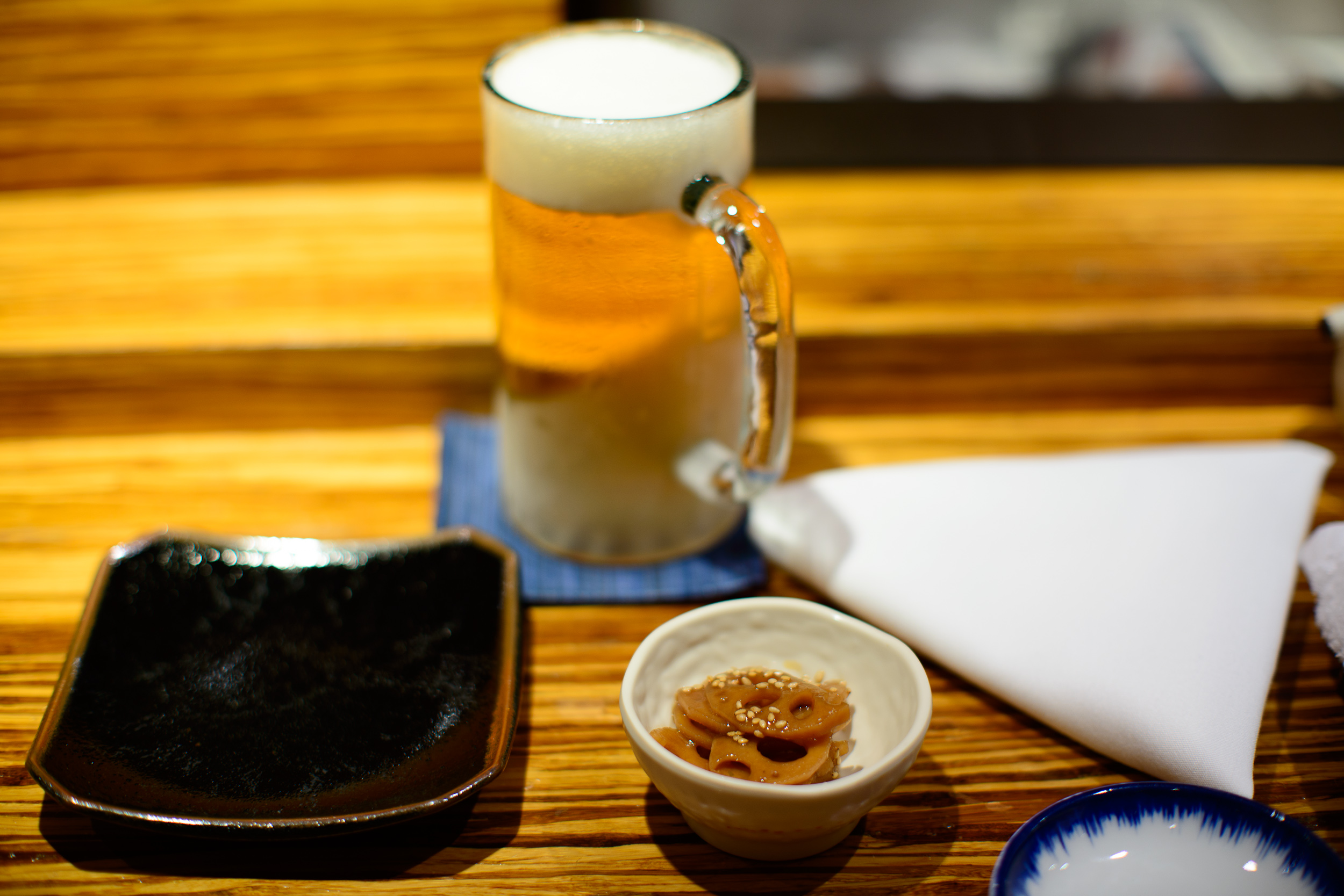 1st Course: Marinated lotus root, Sapporo draft beer