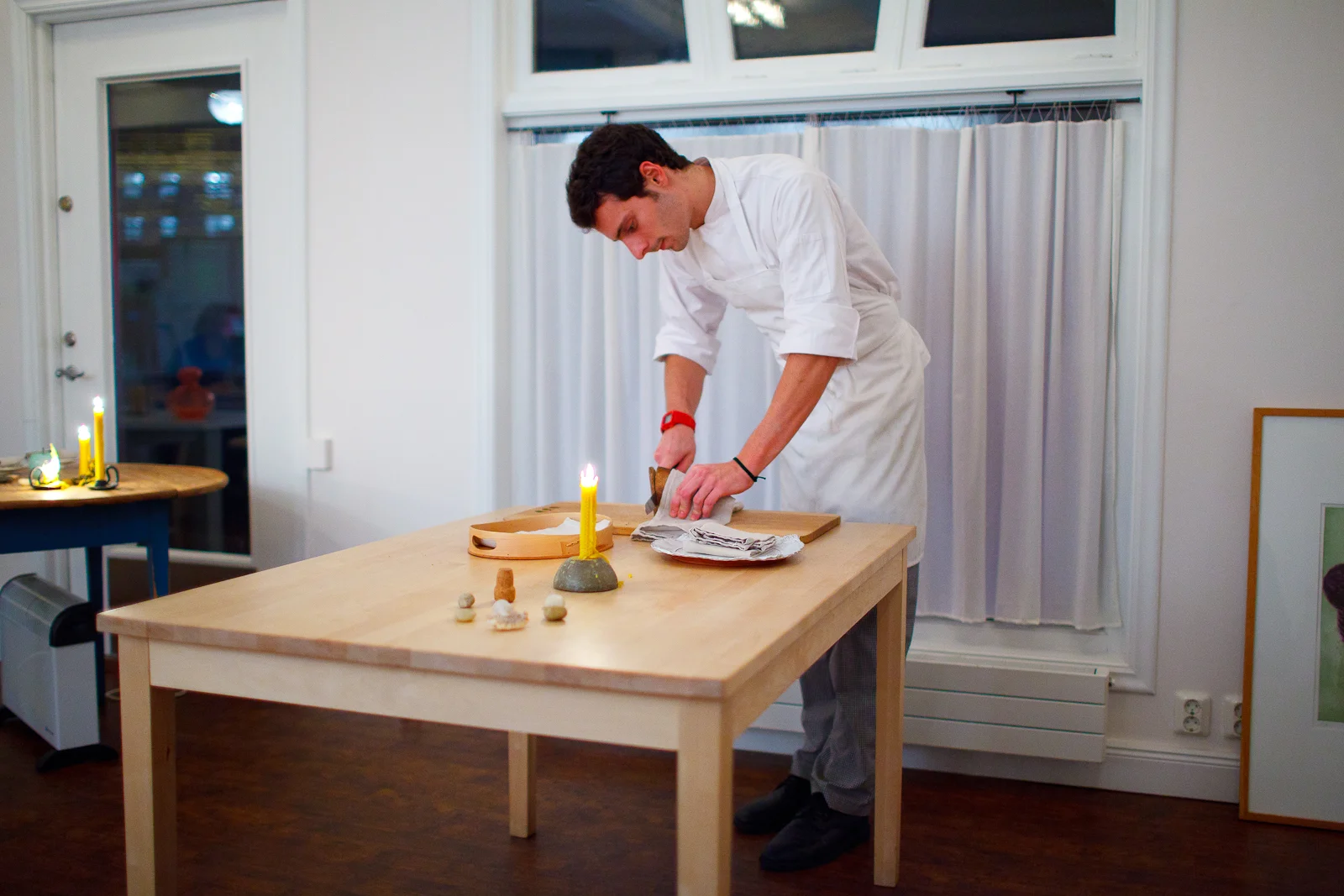Slicing freshly baked bread for the table