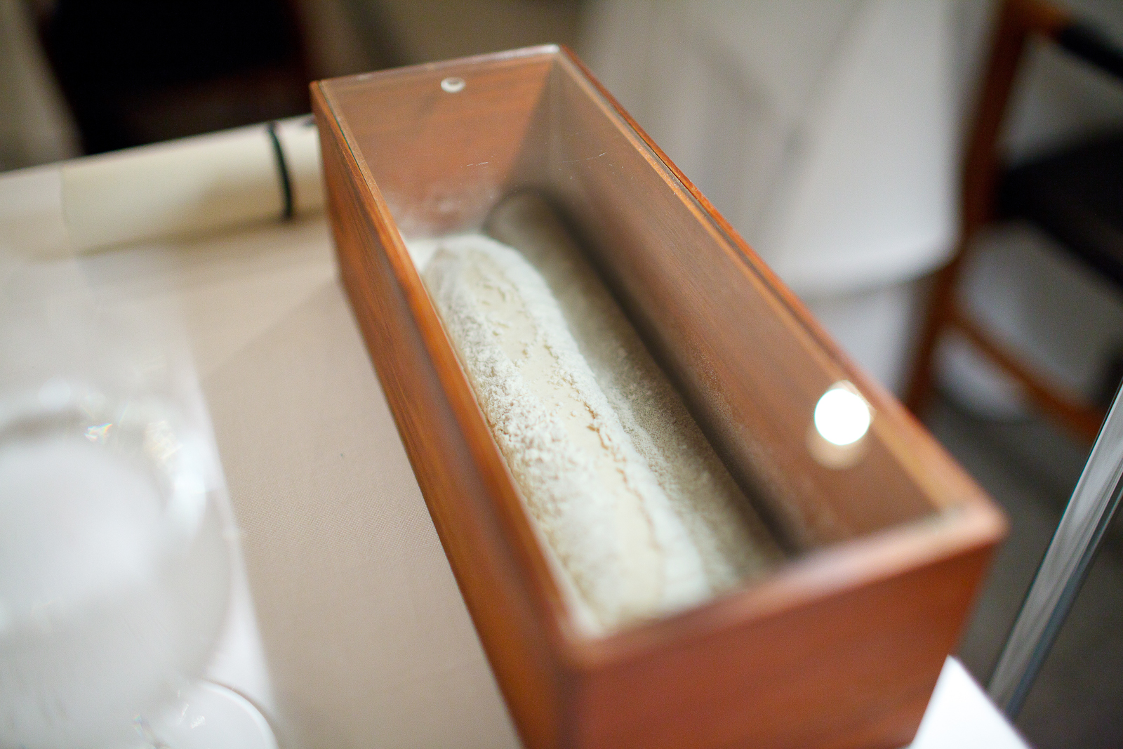 Presentation of the table's bread, rising table-side, to be baked over open fire with just-churned butter.jpg