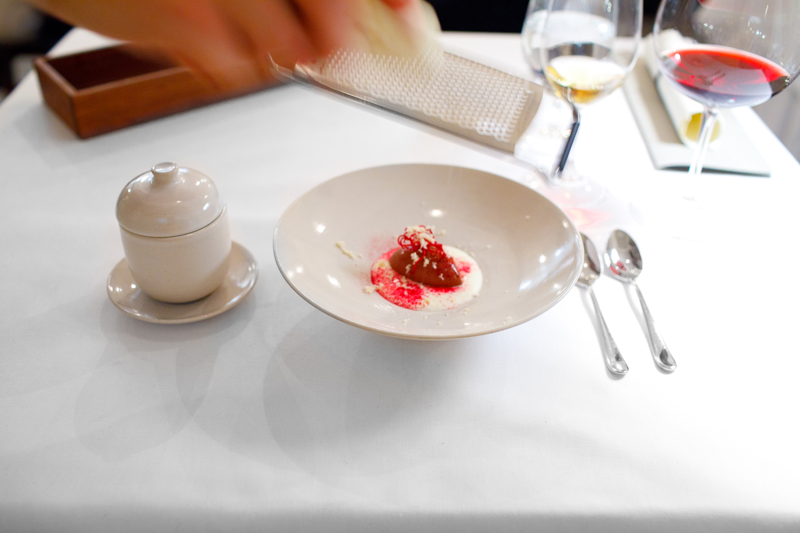 8th Course: Chocolate sorbet coeur de guanaja with horseradish mousse, puré of beetroot and raspberries from last summer, soft-dried apple, cacao nibs and the sprouts from the beetroot