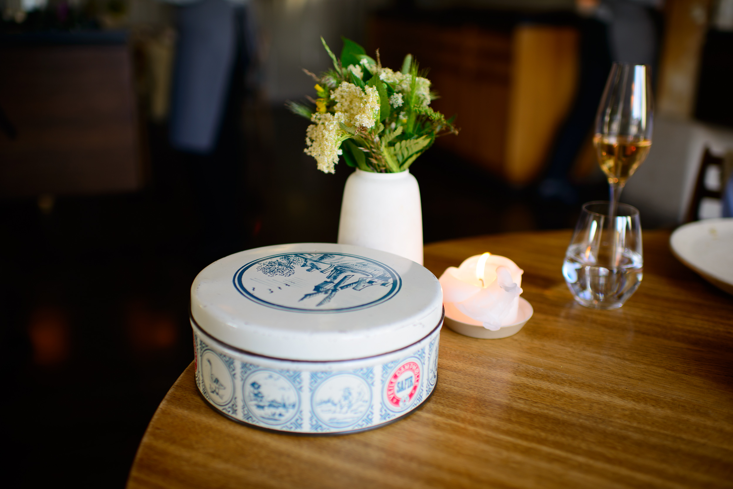 6th Course: Cheese cookie, rocket, and stems, tin can