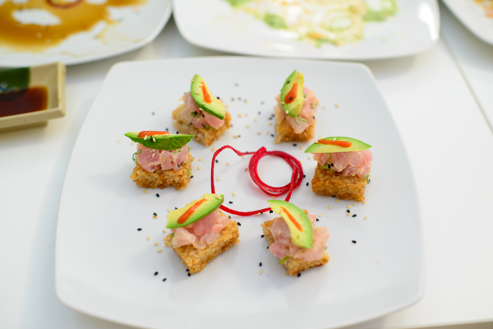 Sushi cakes - Deep-fried rice, tuna, avocado, chile sauce