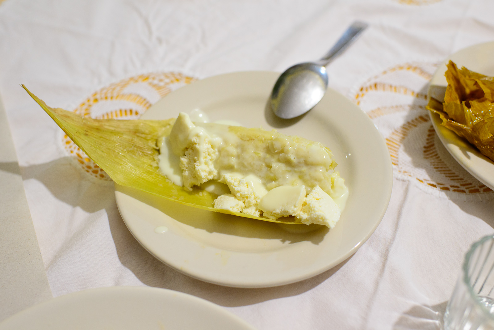 Tamal de elote con crema (Corn tamal, yogurt, fresh cheese)