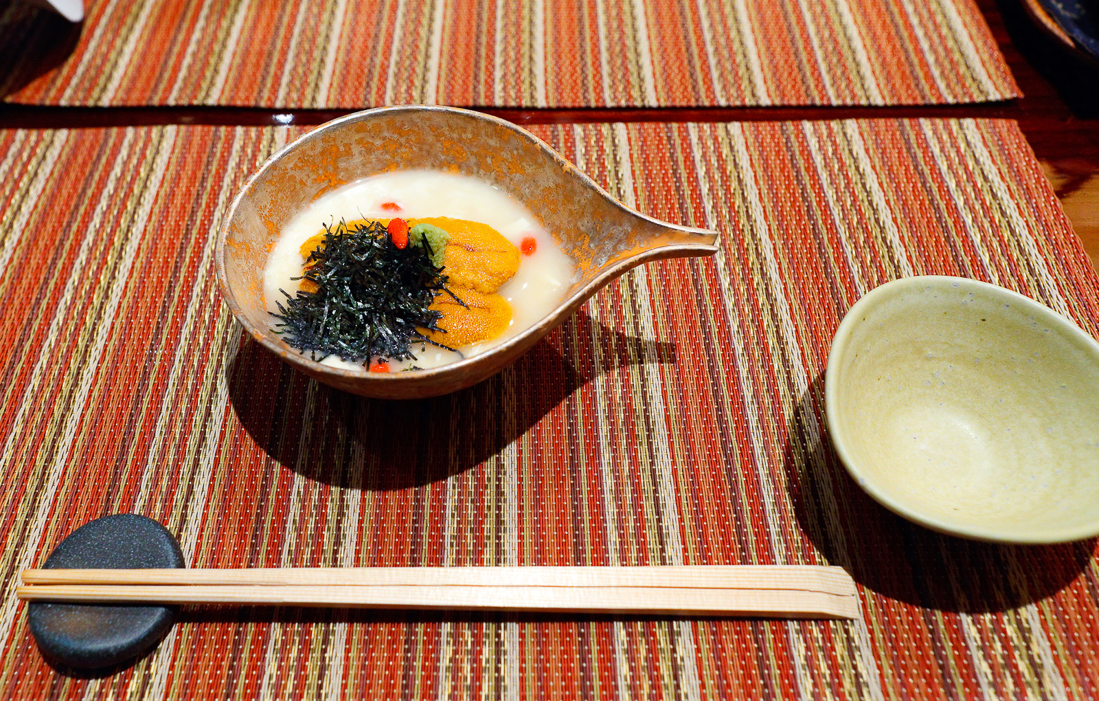 Yuba and uni yoshino style, sea urchin on tofu skin in crystal clear sauce ($14)