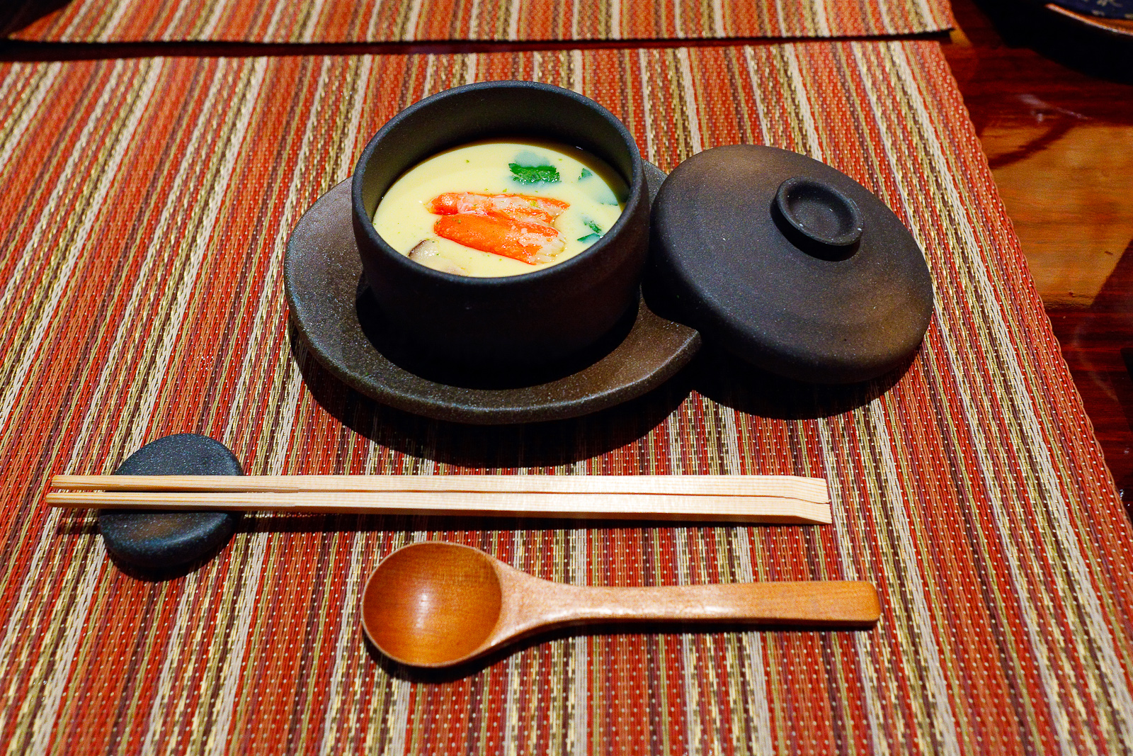 Chawanmushi, steamed egg custard cup with seafood, shrimp, crab, mochi, and vegetables ($10)