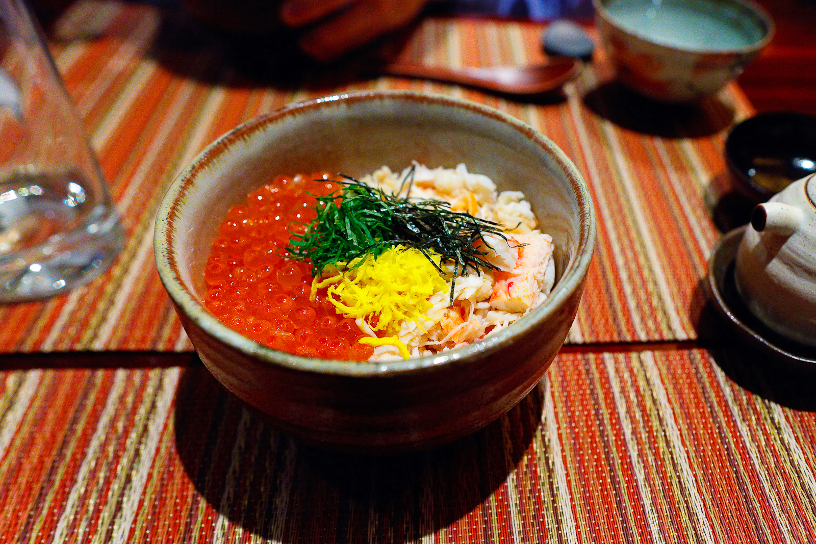 Kani ikura don, Alaskan king crab and dashi-marinated salmon roe over rice ($29)