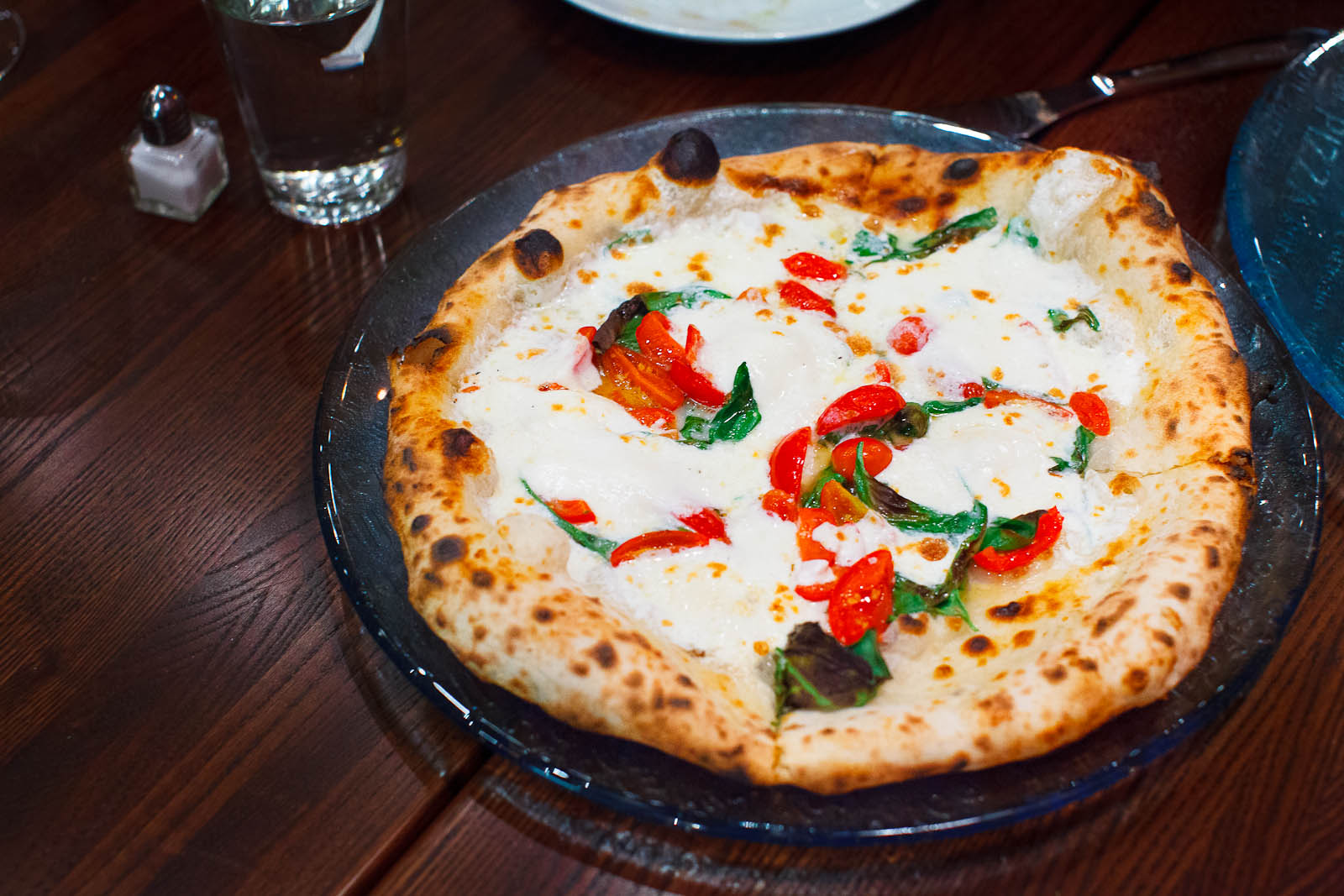 Burrata Roberto - homemade burrata, grape tomatoes, basil, extra