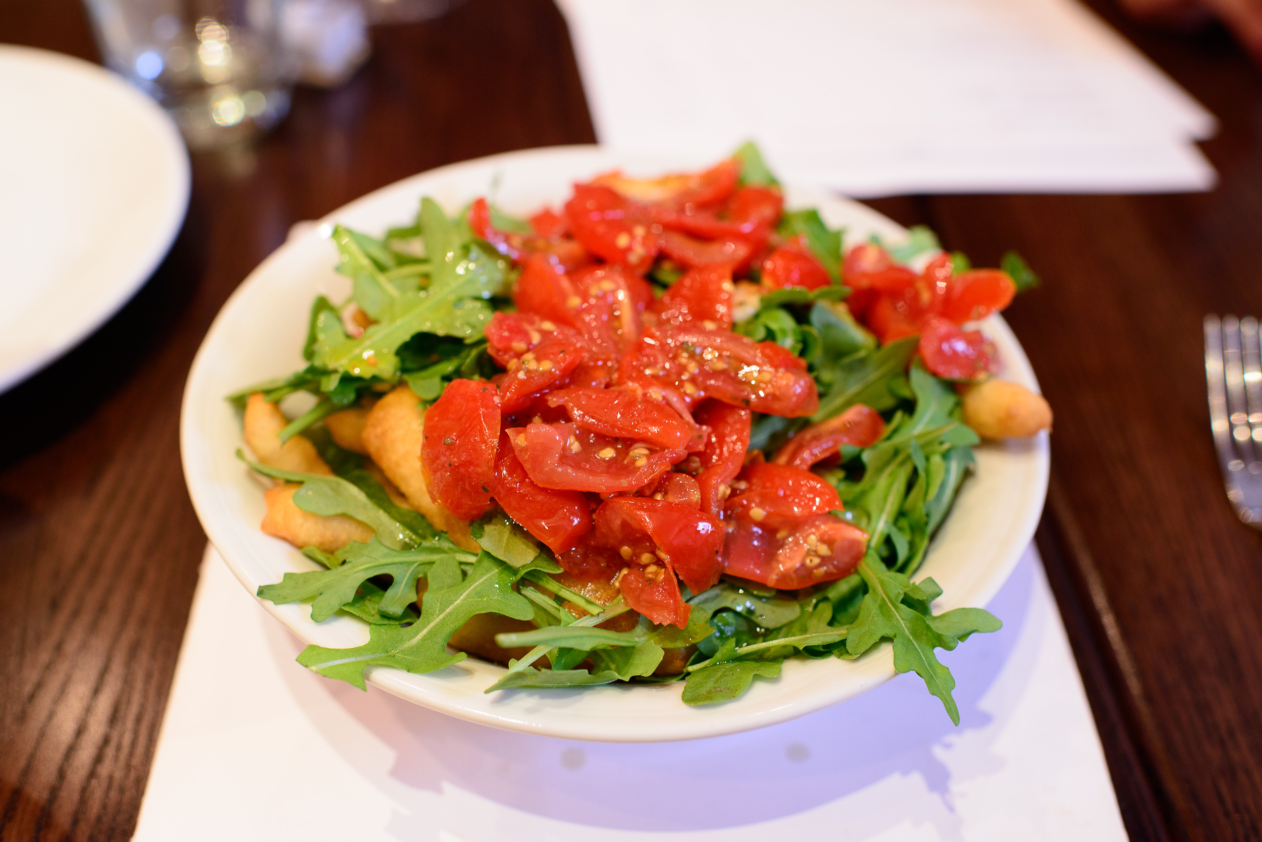 Angioletti - Baby arugula, grape tomatoes, deep-fried dough, bal