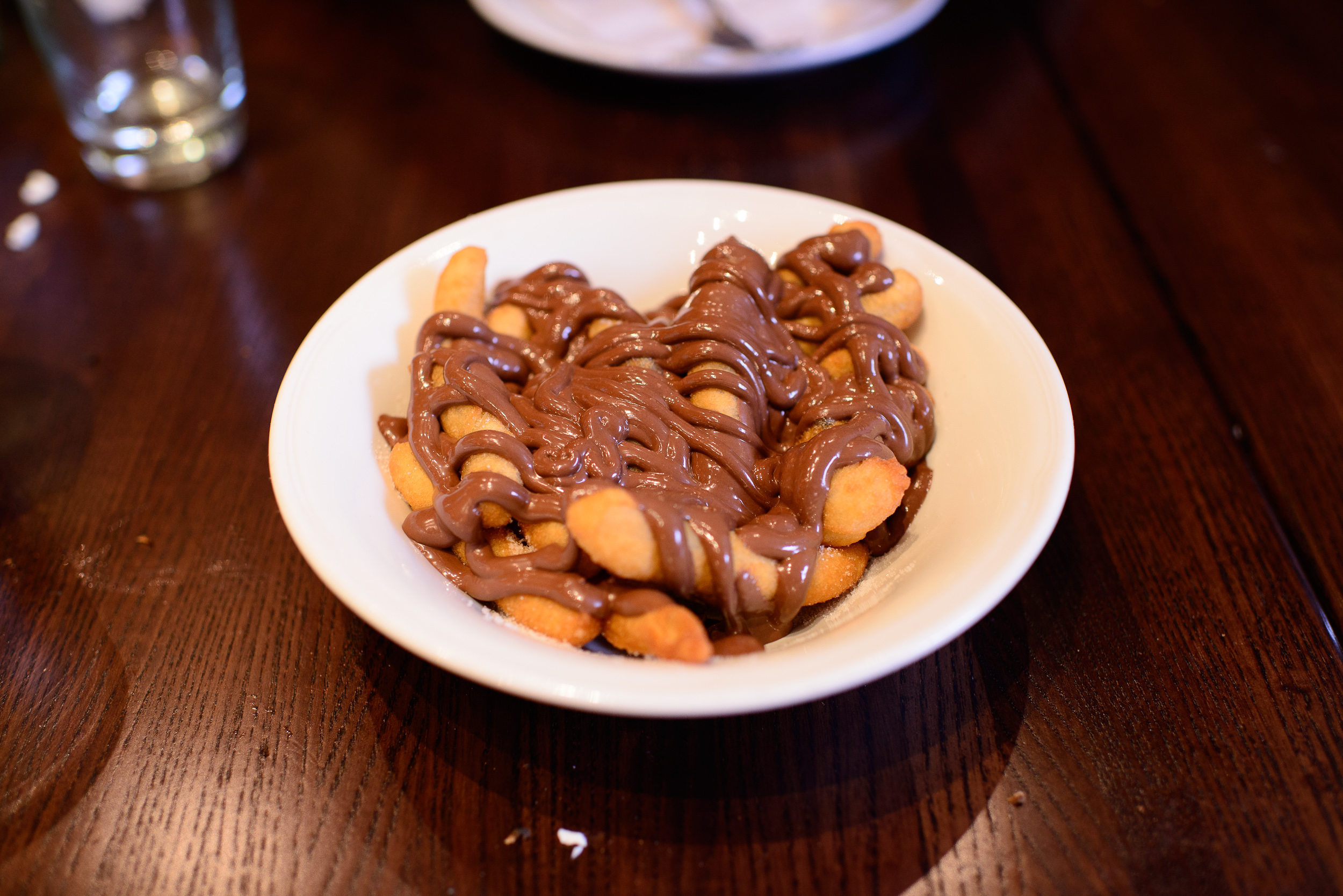 Deep fried dough strips with nutella