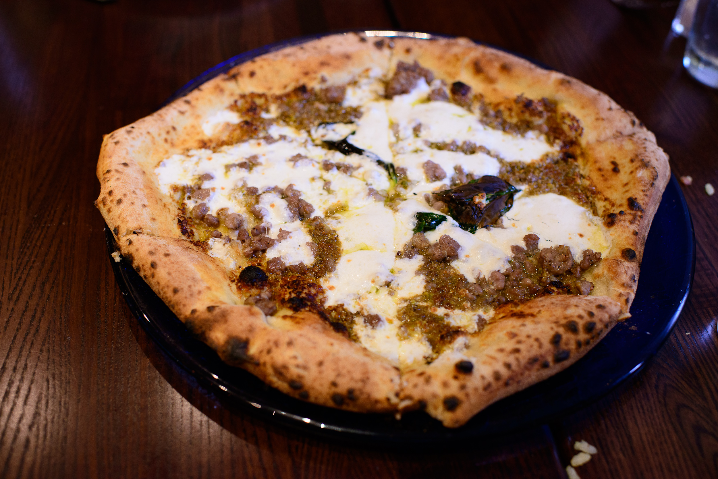 Pizza pistacchio e salsiccia - fresh pistachio pesto, sausage, h