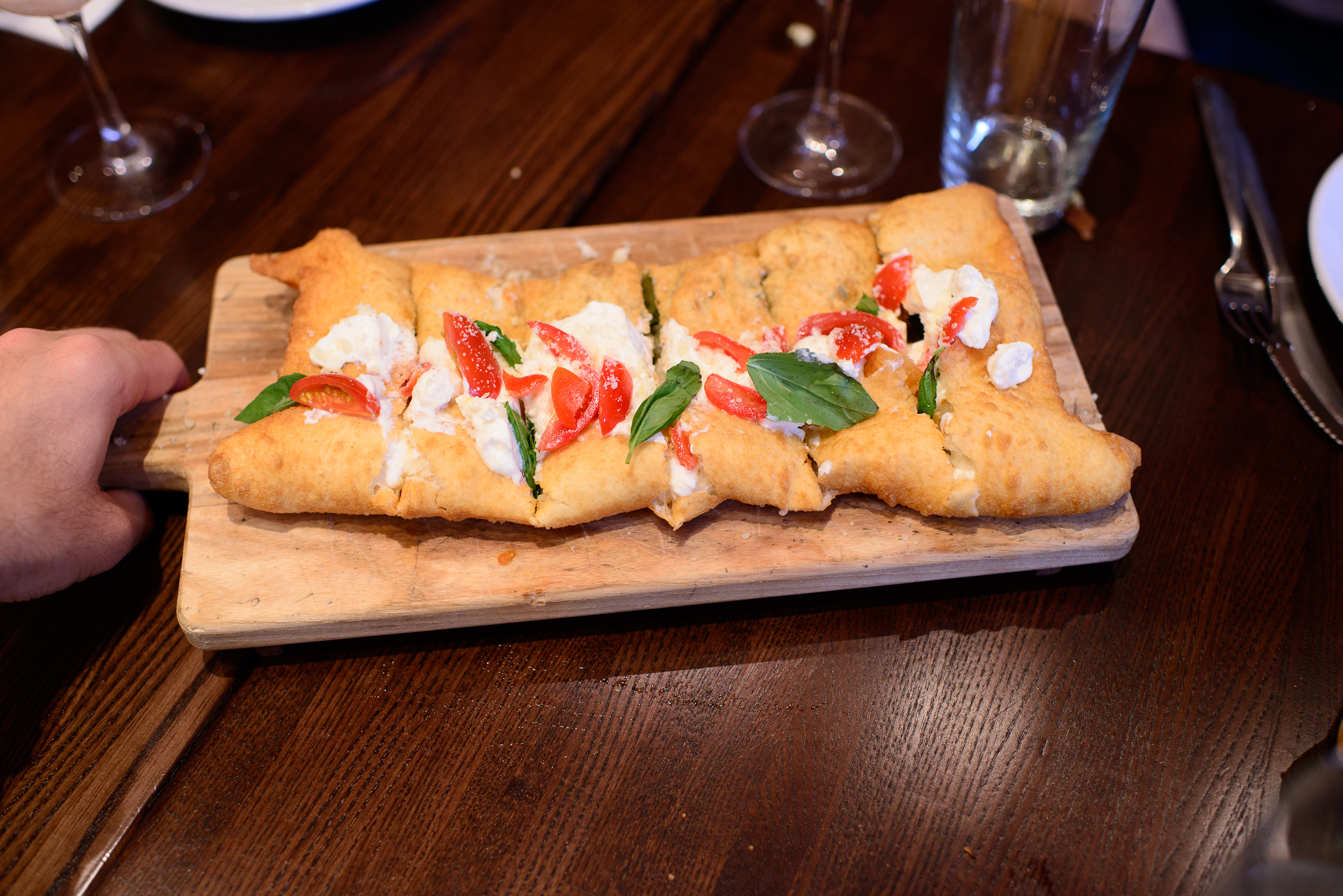 Calzone fritto - filled with escarole, gaeta olives, pine nuts a