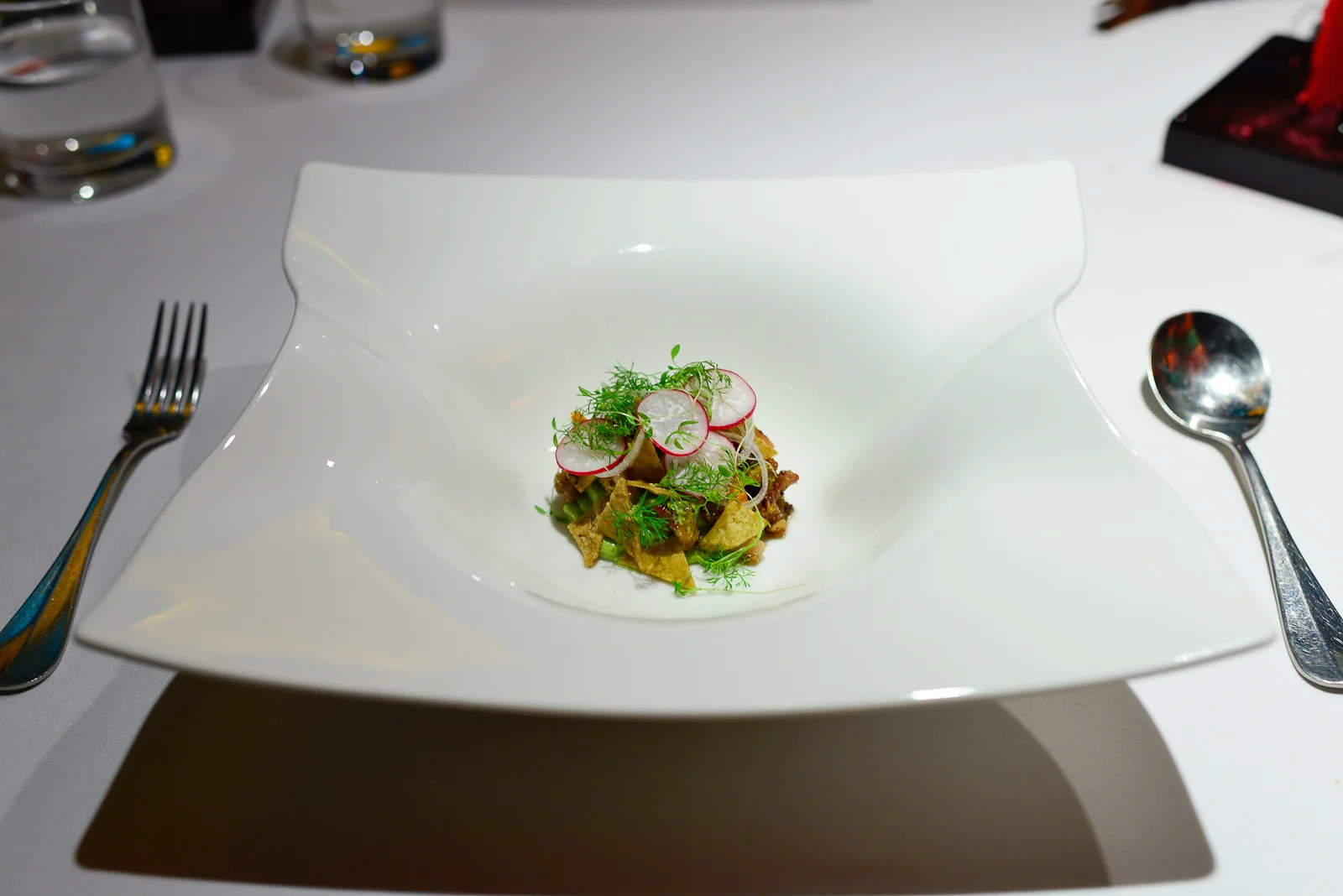 5th Course: Costillitas y cueritos de lechón, yema de huevo, gu
