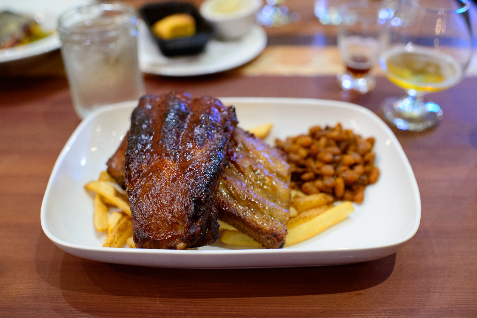 St. Louis-style ribs - barbecue baked beans, french fries ($25)