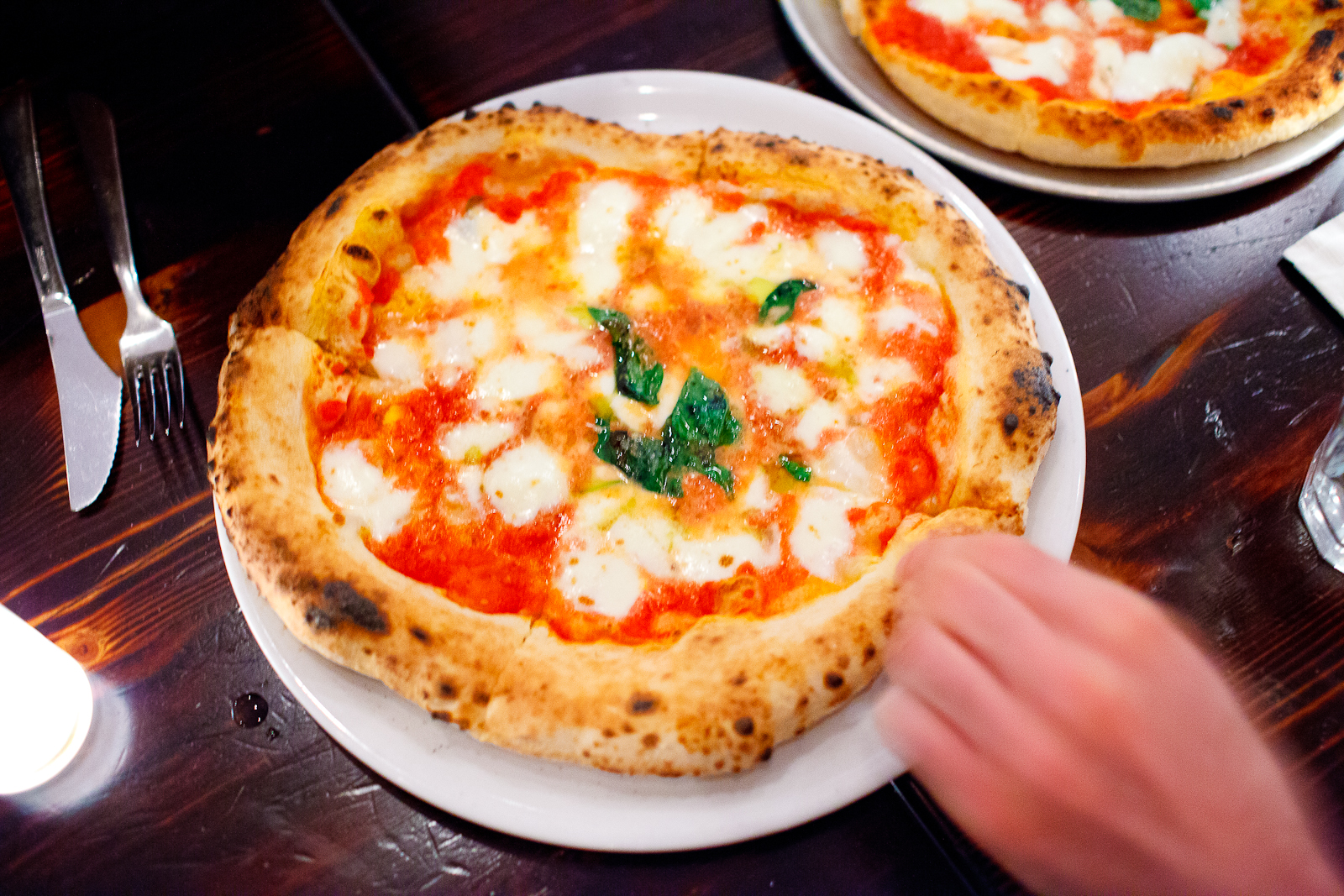 Pizza rossa - Margherita (tomato sauce, homemade mozzarella, basil) ($11)