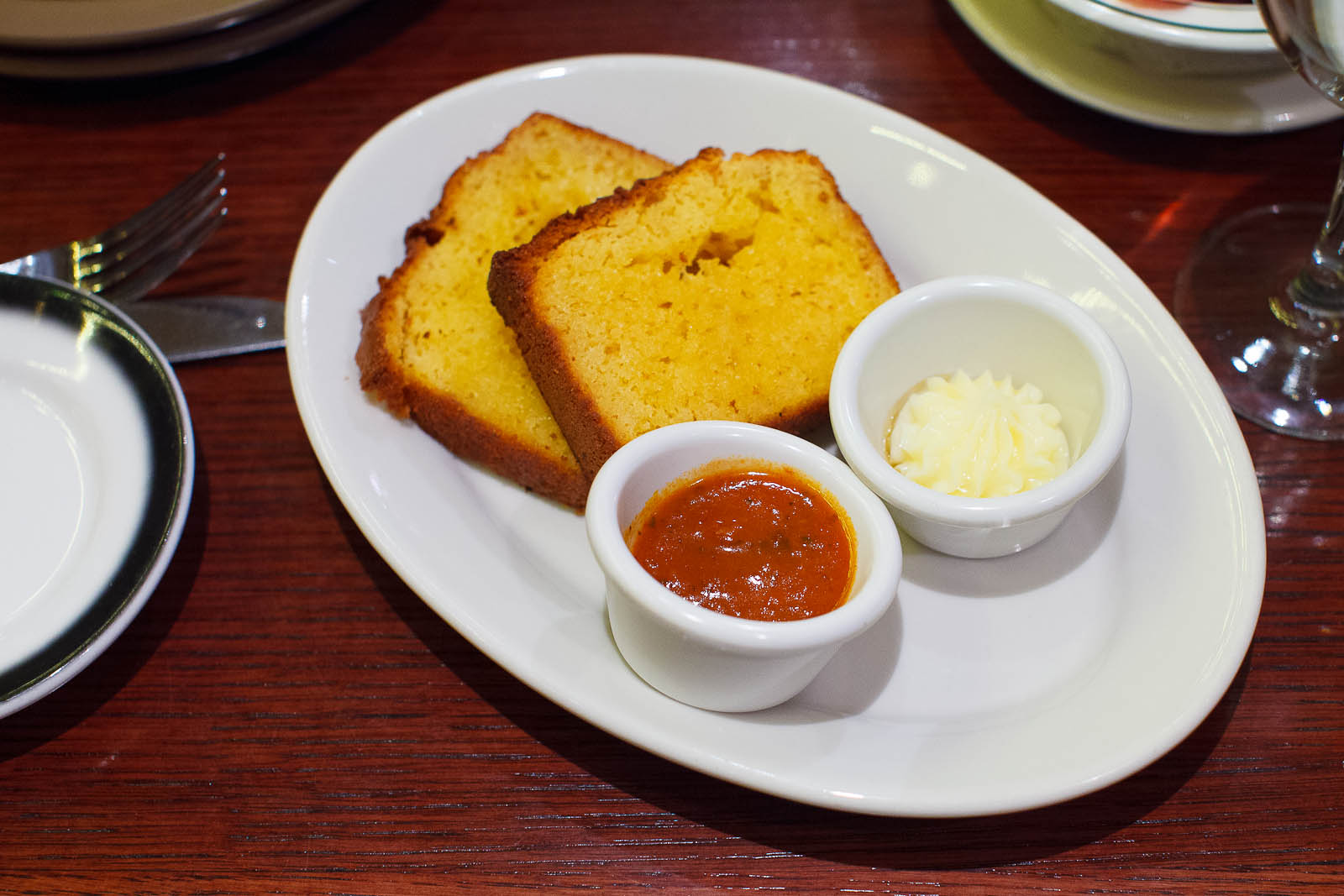Corn bread - honey butter, tomato jam ($5)