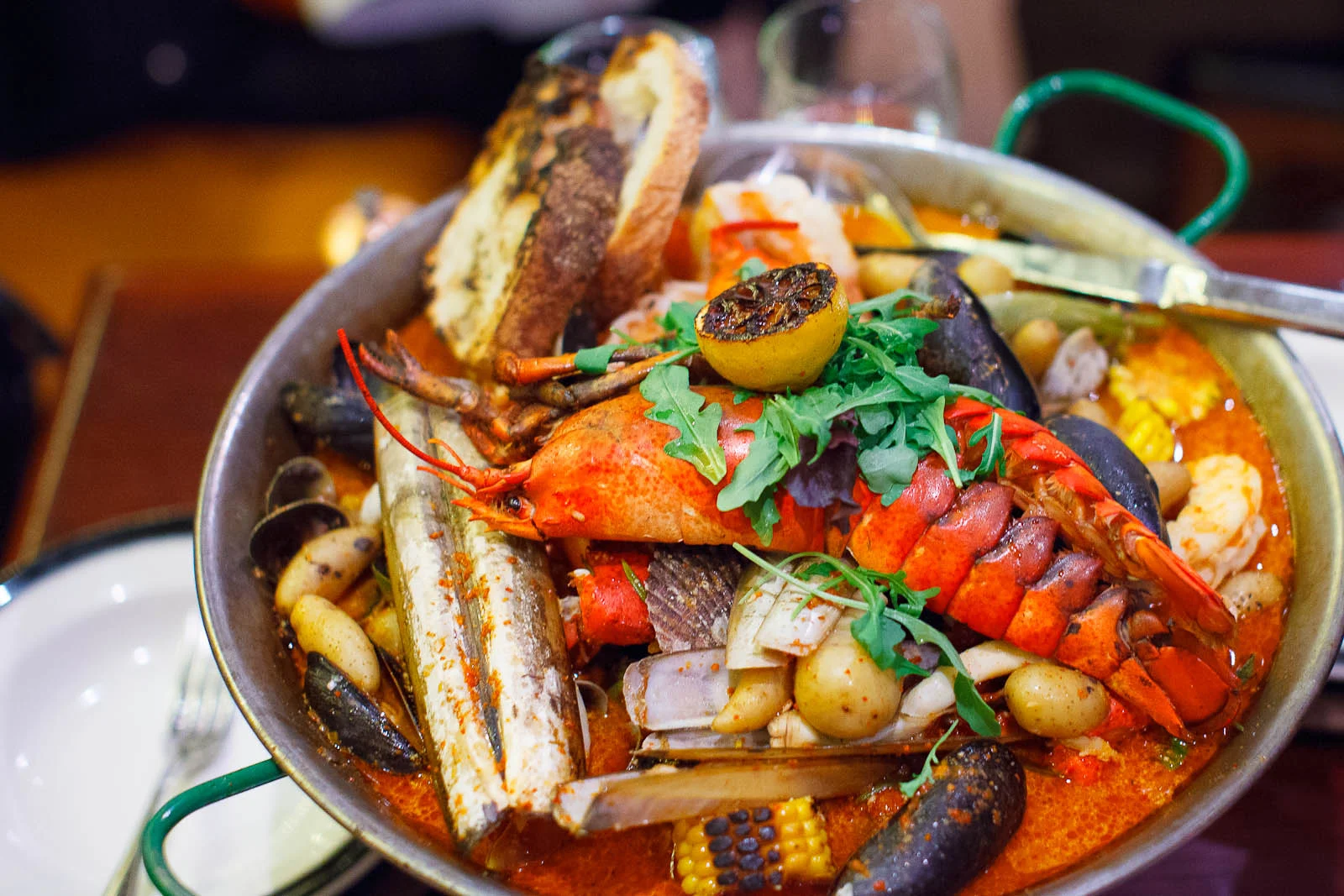 Harlem chowder - lobster, clams, potatoes, mussel broth ($64)