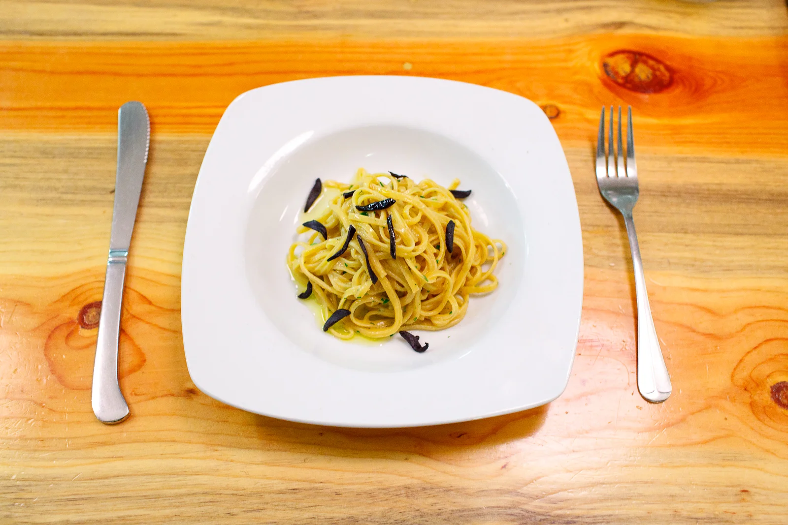 Chitarra square spaghetti, sea urchin, black garlic, parsley ($15)
