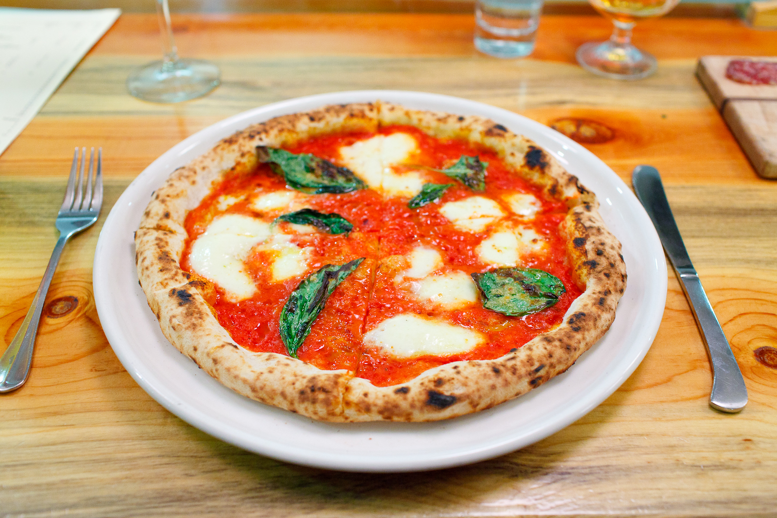 Pizza daisy - tomato sauce, mozzarella, basil, olive oil ($12)