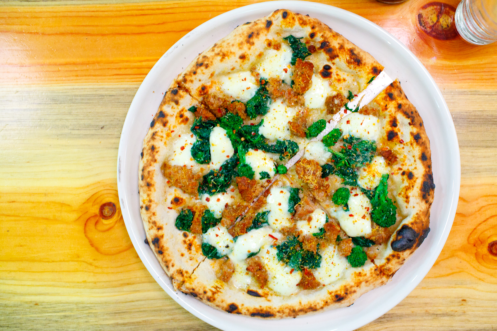 Pizza "cart-driver" - sausage, rapini, mozzarella, fennel pollen, chilies ($14)