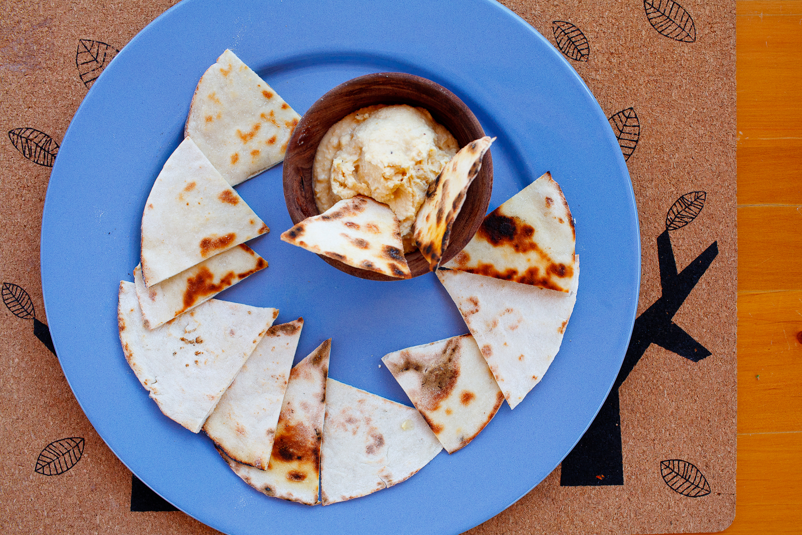 Fire-toasted flatbreads with hummus