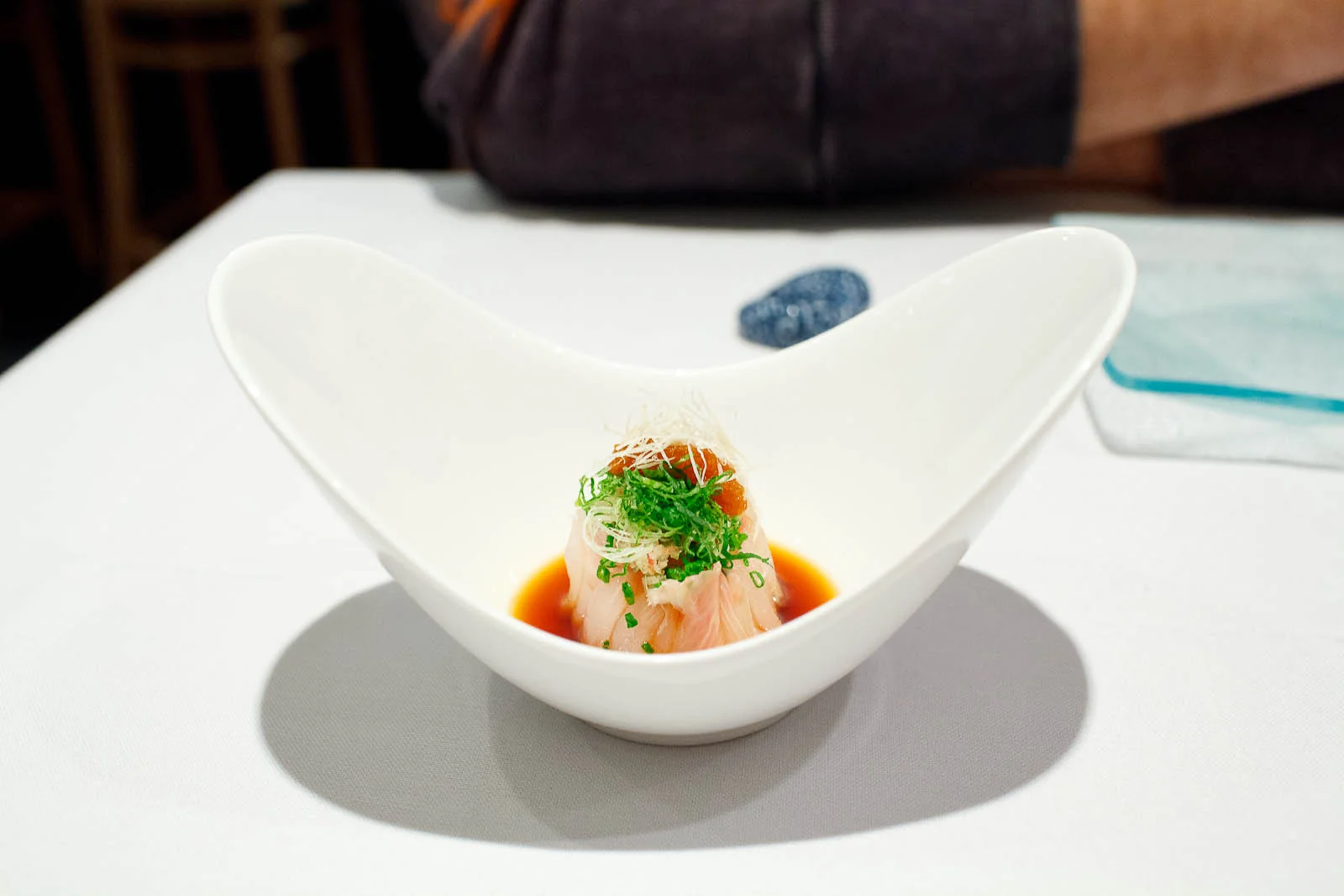 Fluke ponzu - thinly sliced fluke with chive, shiso leaf, under