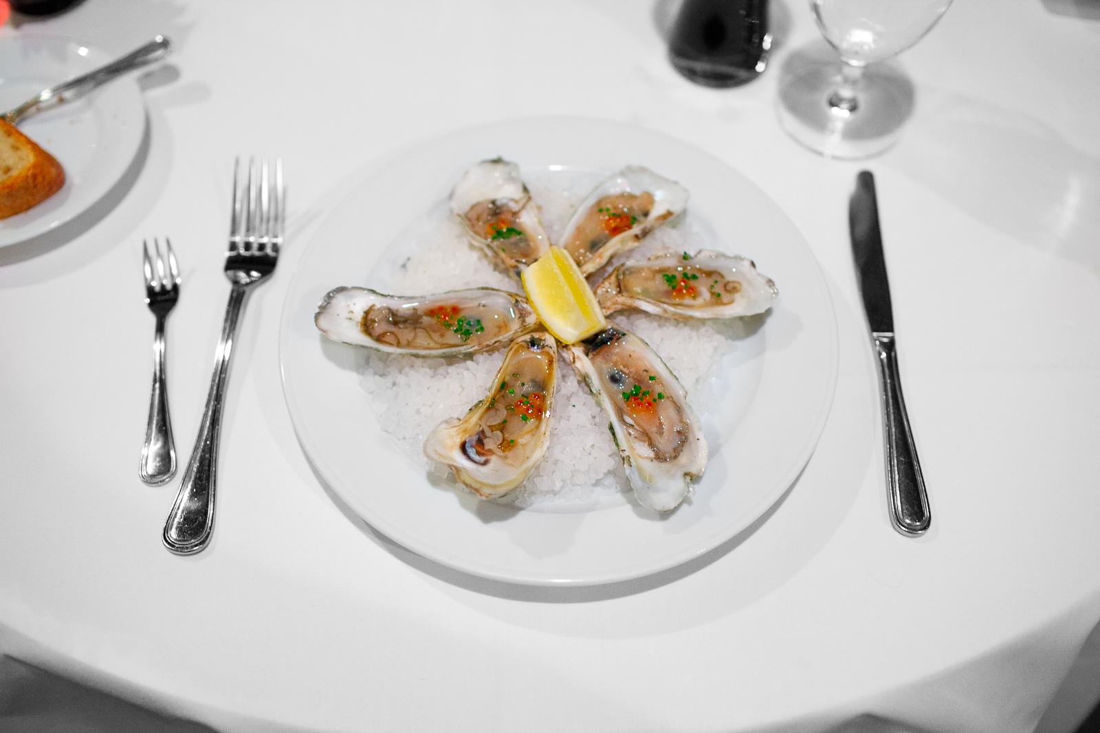 Capers "blades" oysters on the half shell, smoked steelhead roe, chardonnay mignonette ($16)