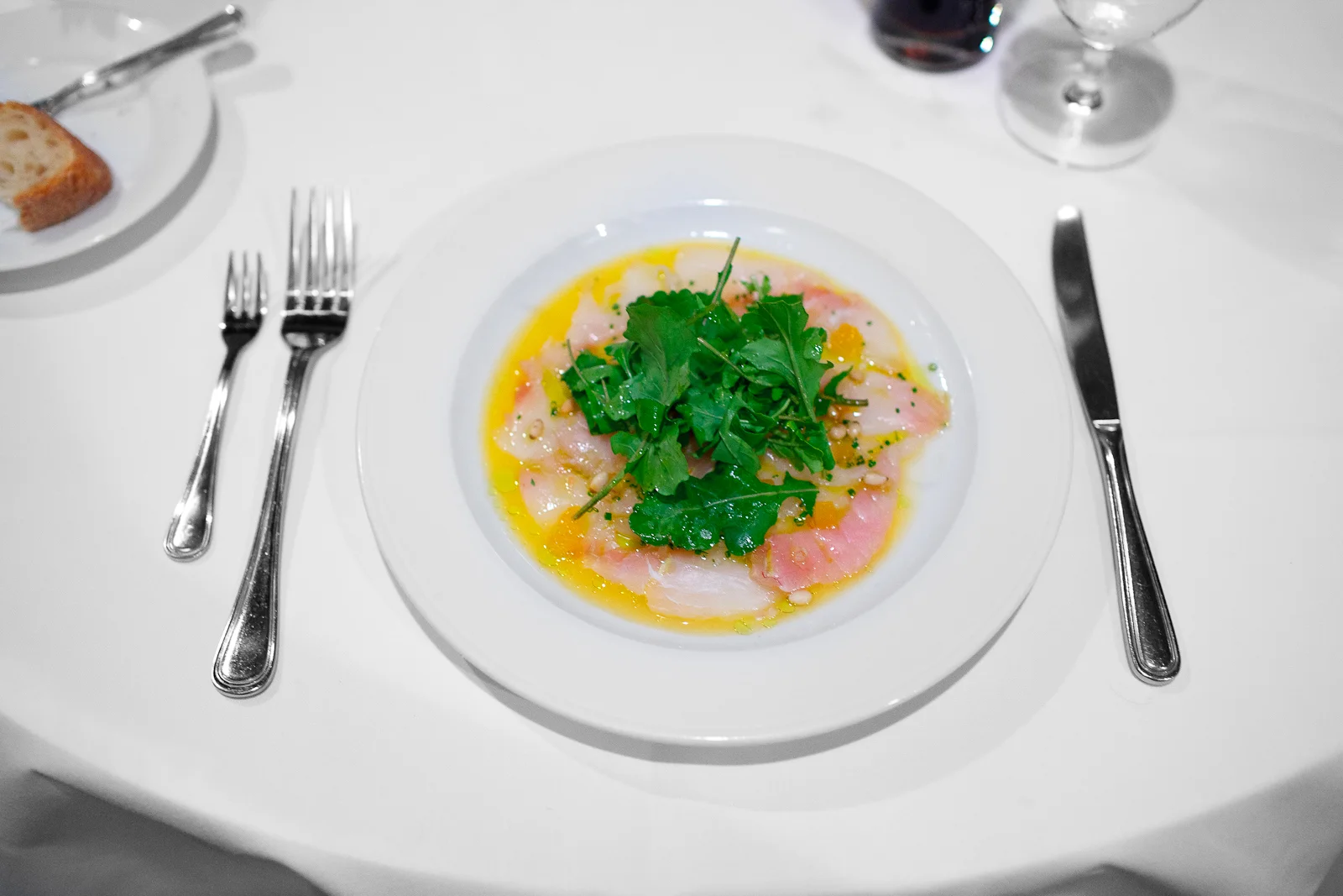Triggerfish carpacio, satsuma, pine nut, arugula, olio nuovo ($14)